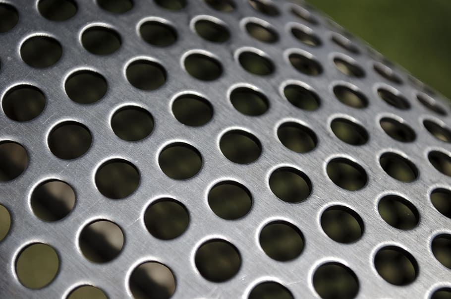 Metal strip with holes