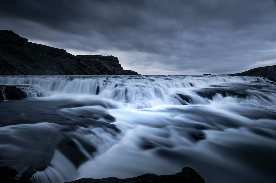 Hd Wallpaper Water Flows Near Mountain Under Dark Sky Waterfalls