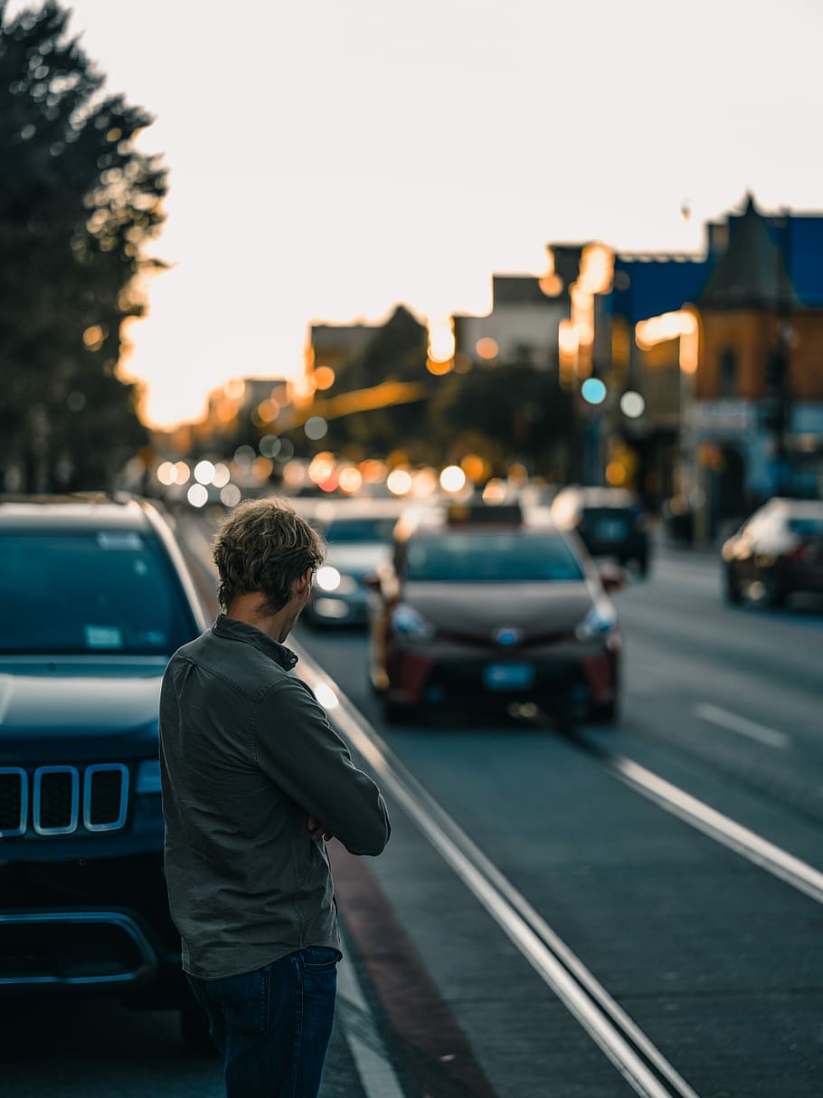 HD Wallpaper Man Standing Near Vehicle Selective Focus Of Man