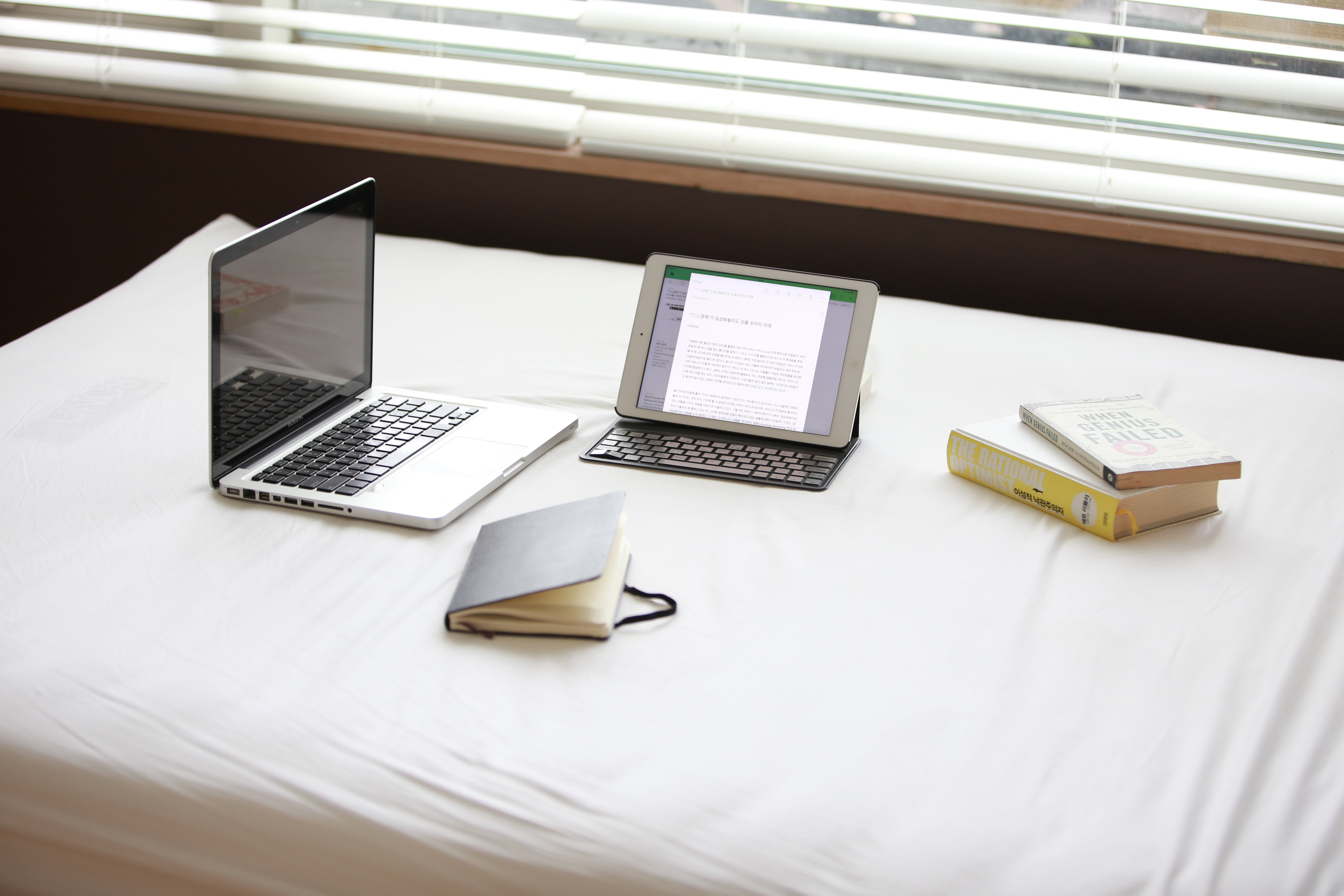 MacBook Pro beside white iPad, laptop, notebook, technology, computer