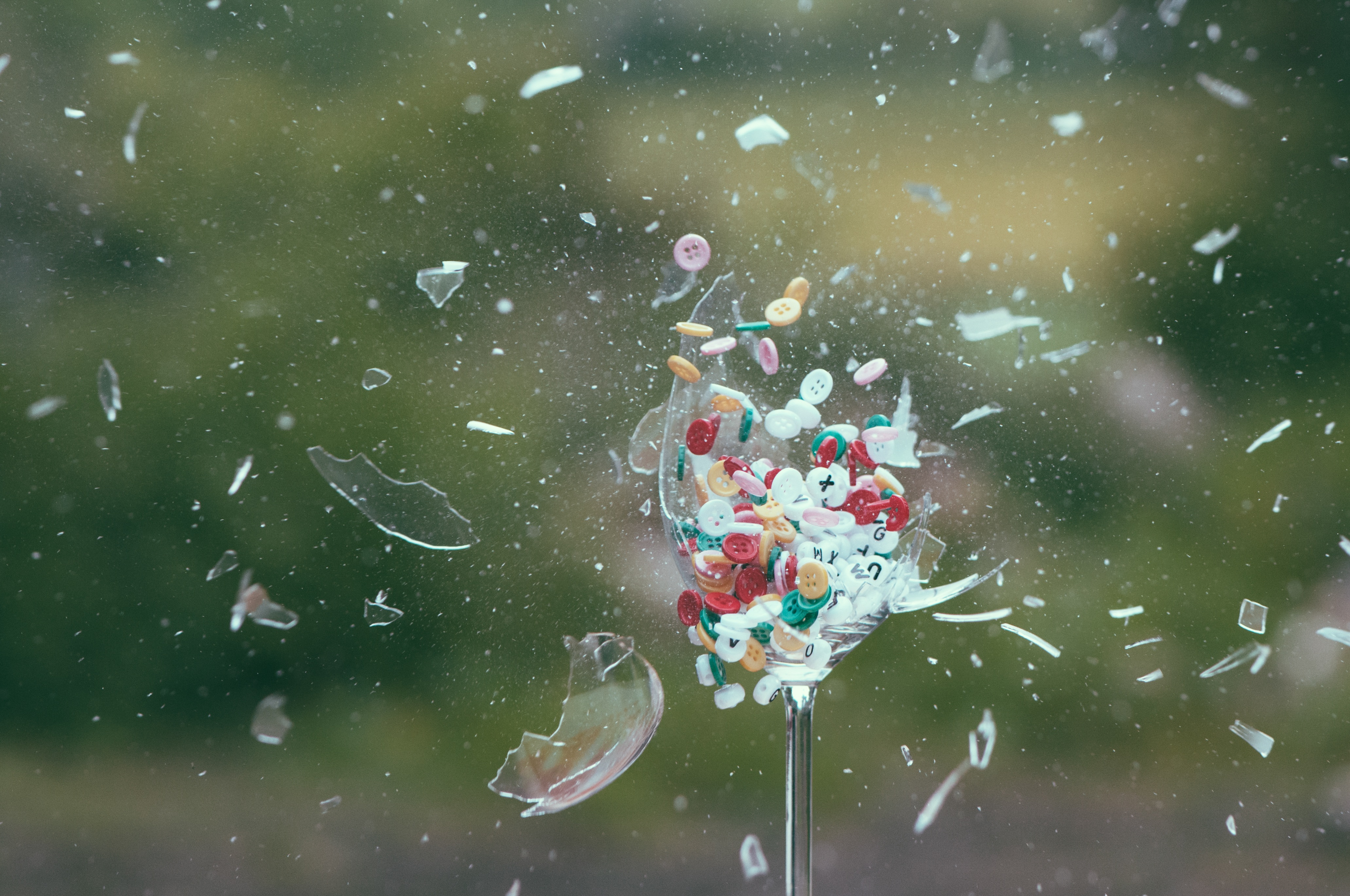 photo of broken glass, explosion, buttons, exploding, dynamic