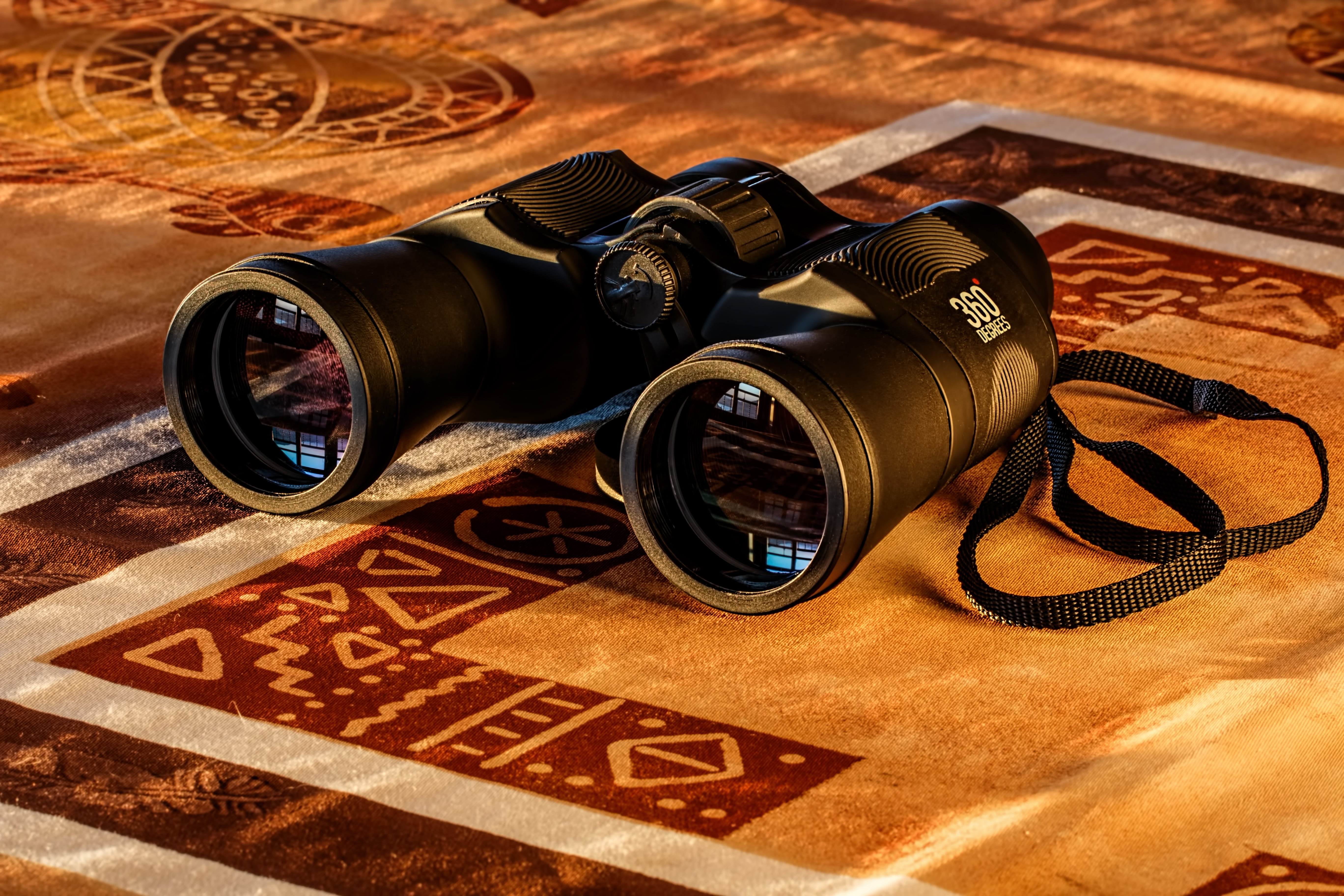 black binoculars on mat, birdwatching, spy glass, spying, dawn