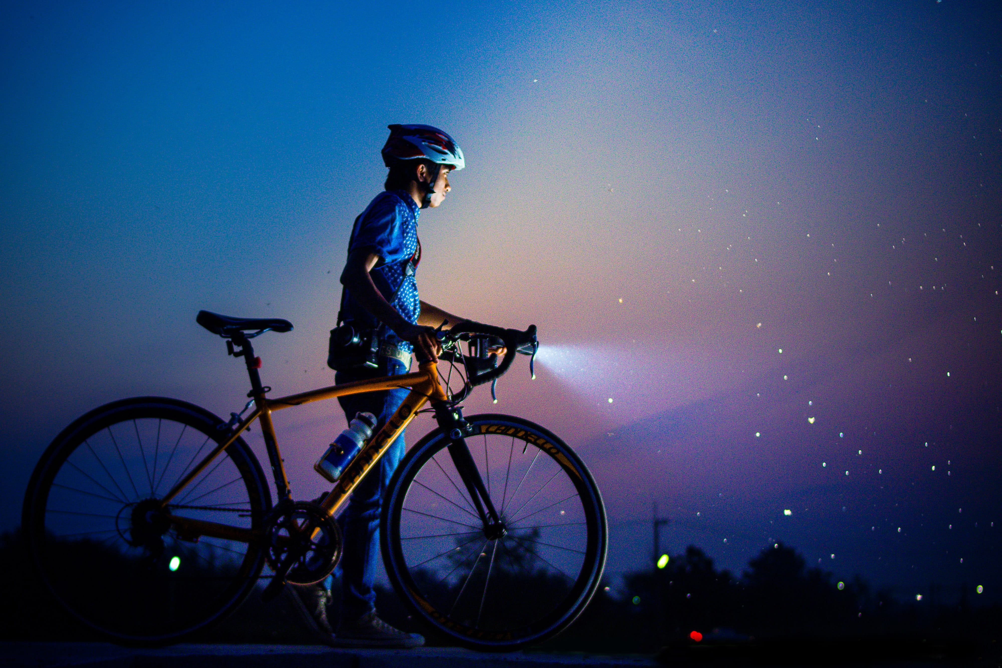 Man out with bicycle at night, people, adventure, bicycles, bike