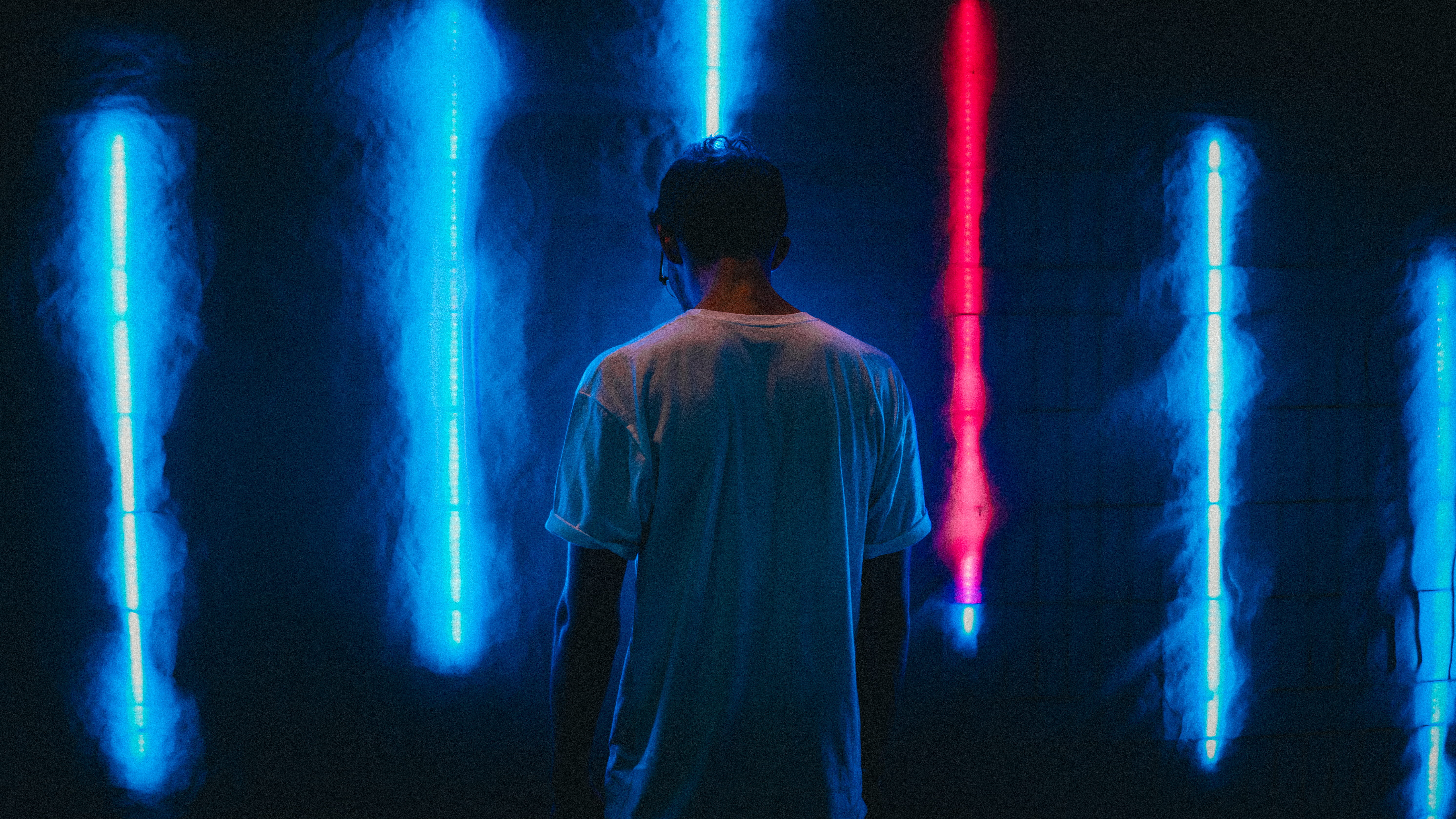 man standing near blue LED strips, night, light, man, male, wall, neon