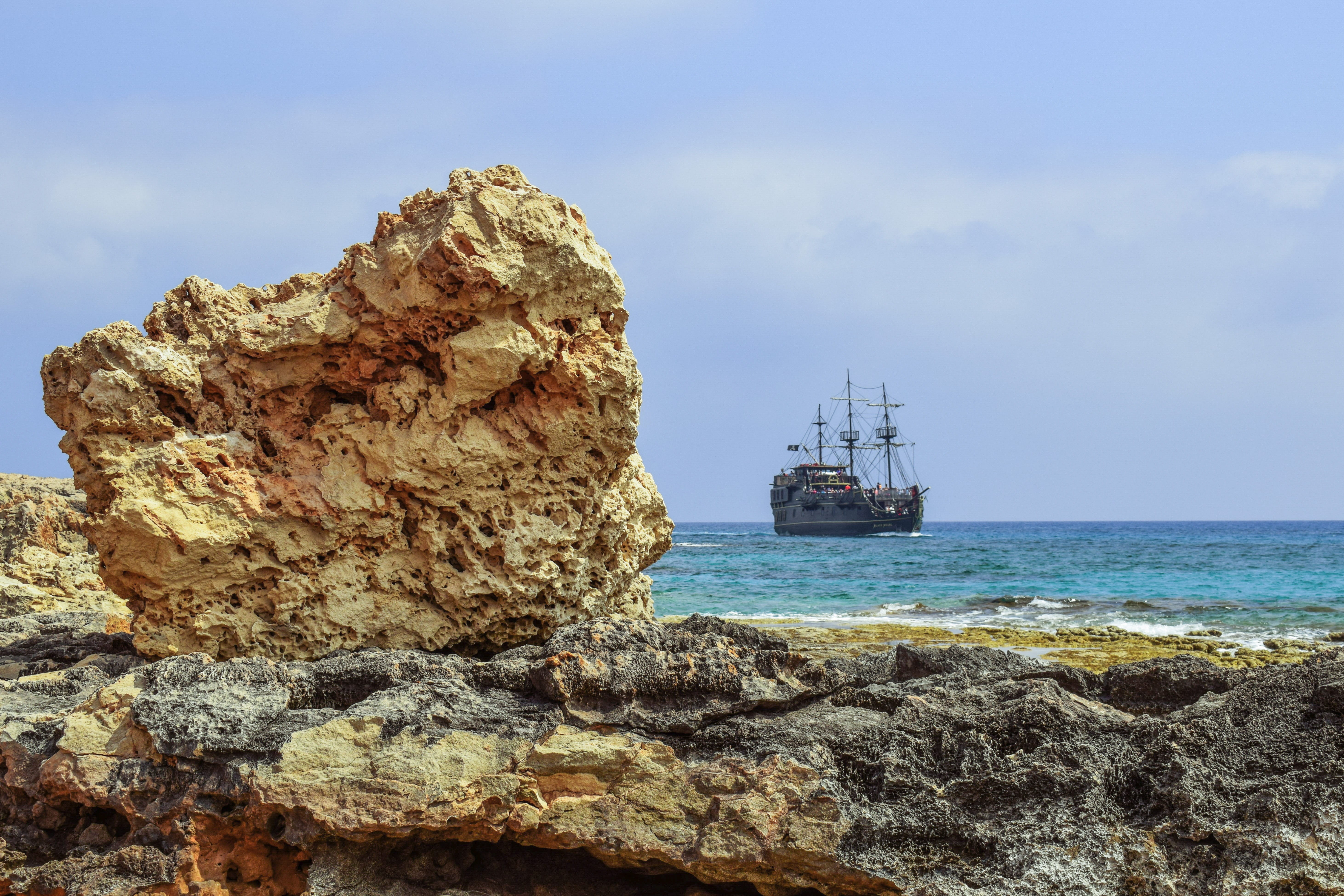 Rock, Landscape, rocky coast, pirate ship, sailboat, sea, cruise ship