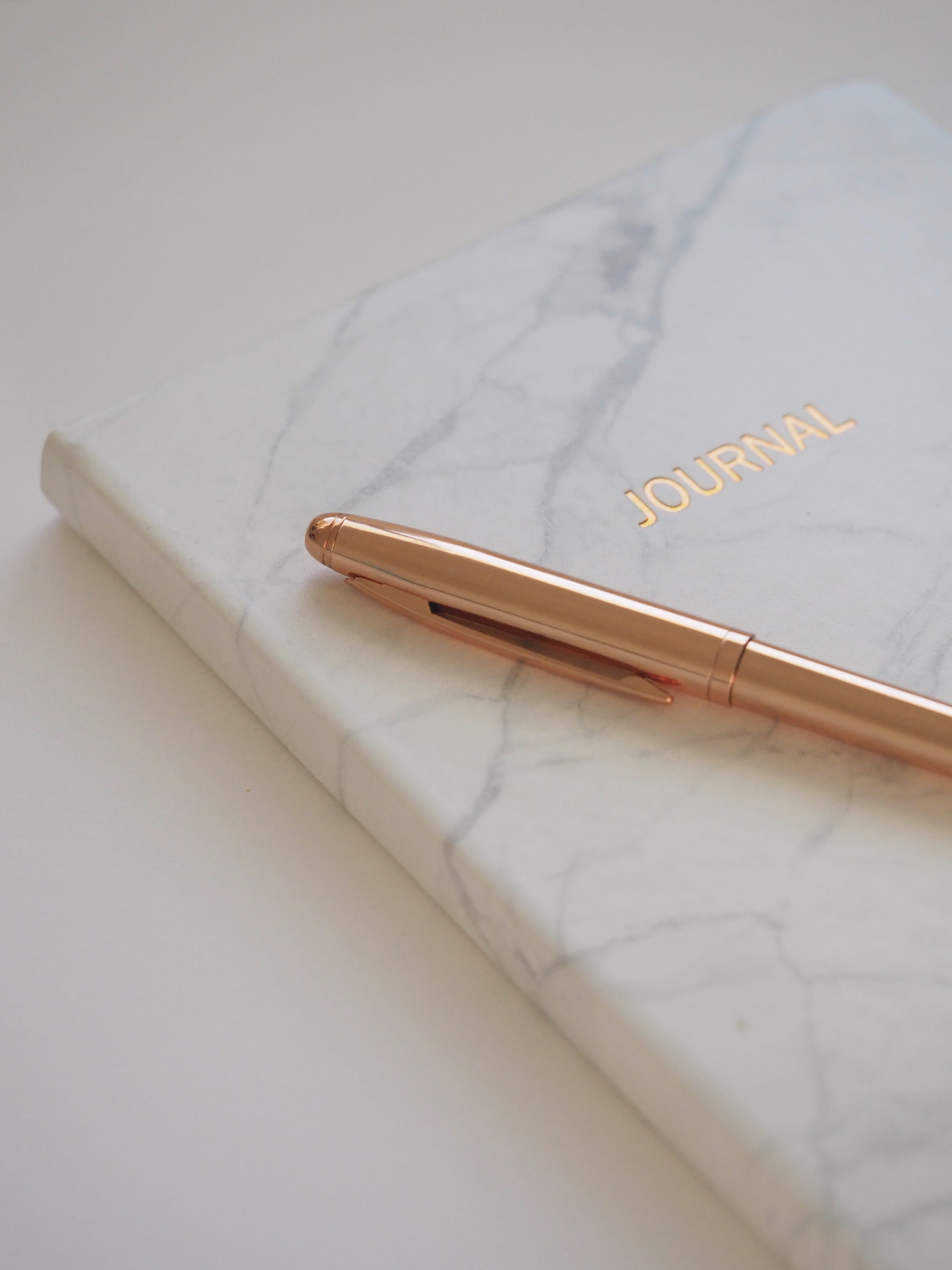 gold ballpoint pen, gold pen on Journal book, rose gold, diary