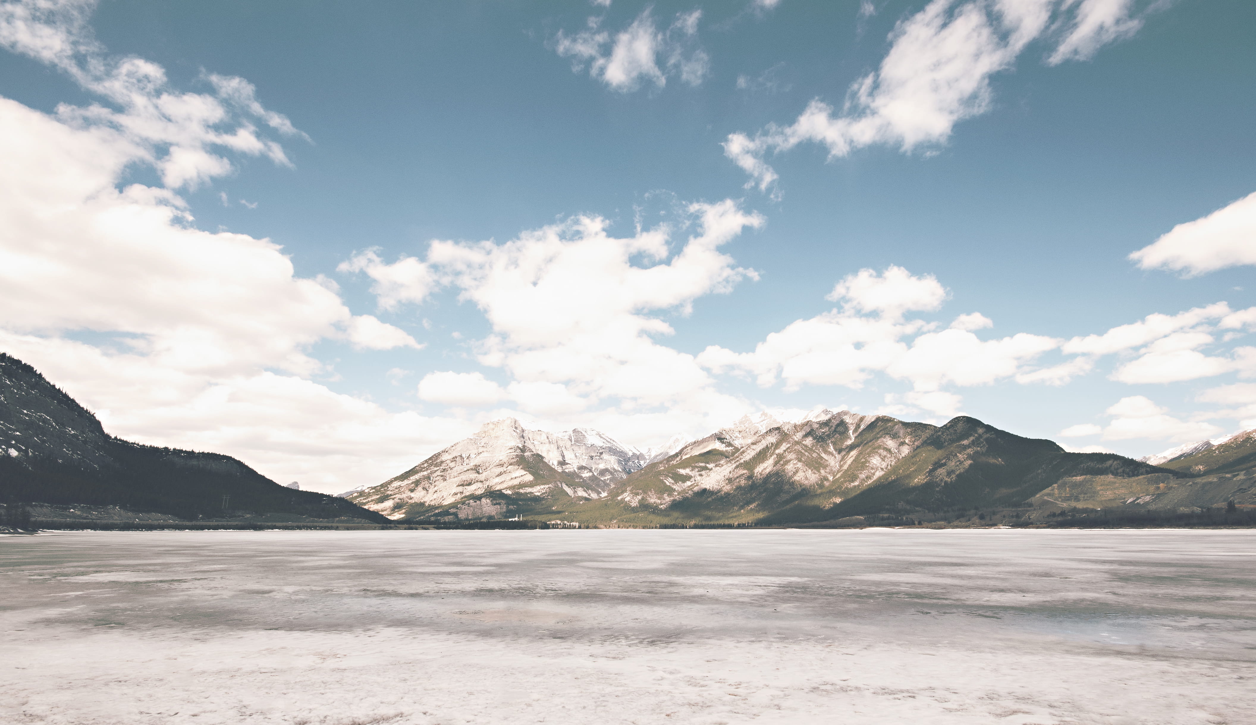 White Brown Mountain Under White Cloud and Blue Sky during Daytime