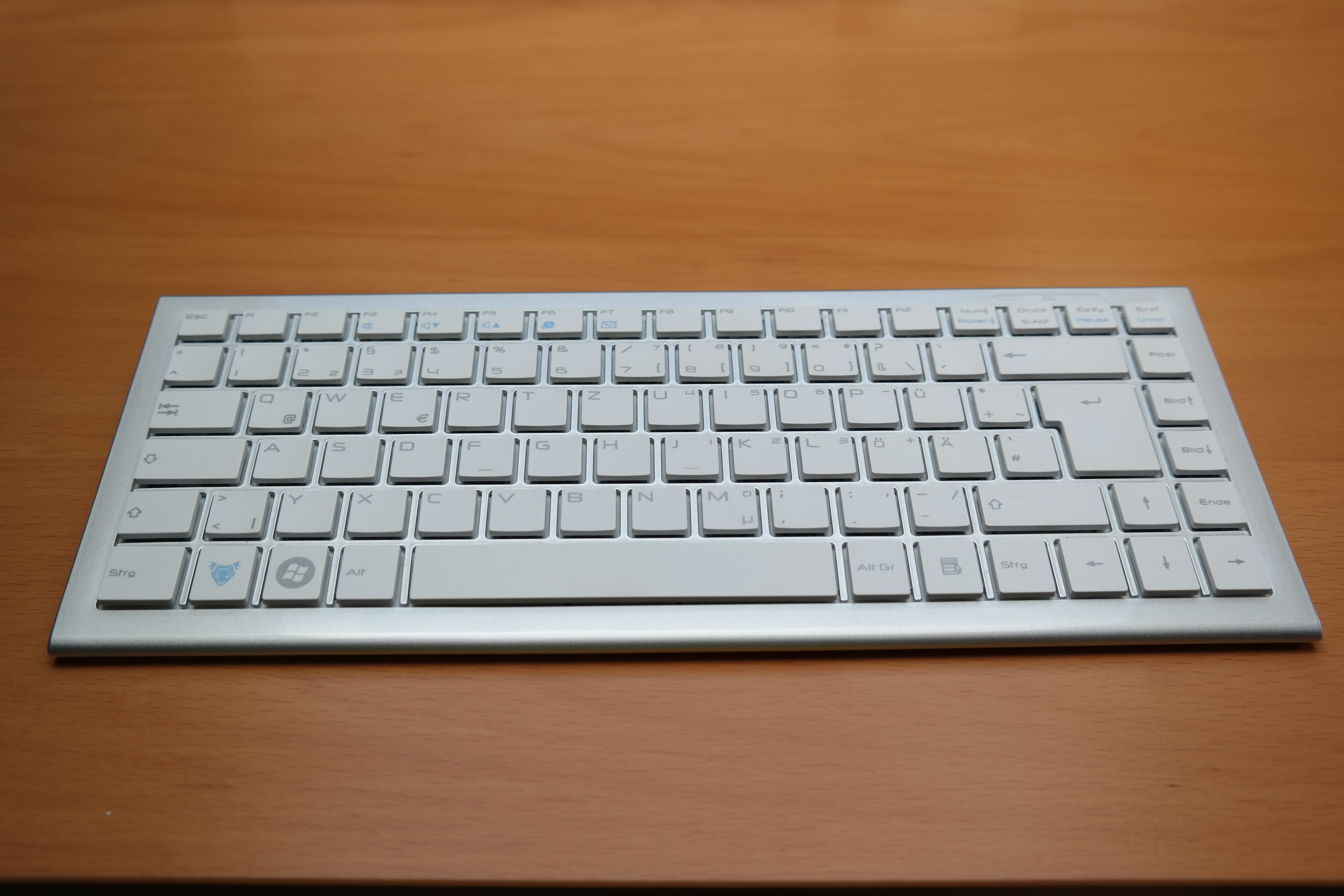 gray wireless computer keyboard on table, input, keys, hardware