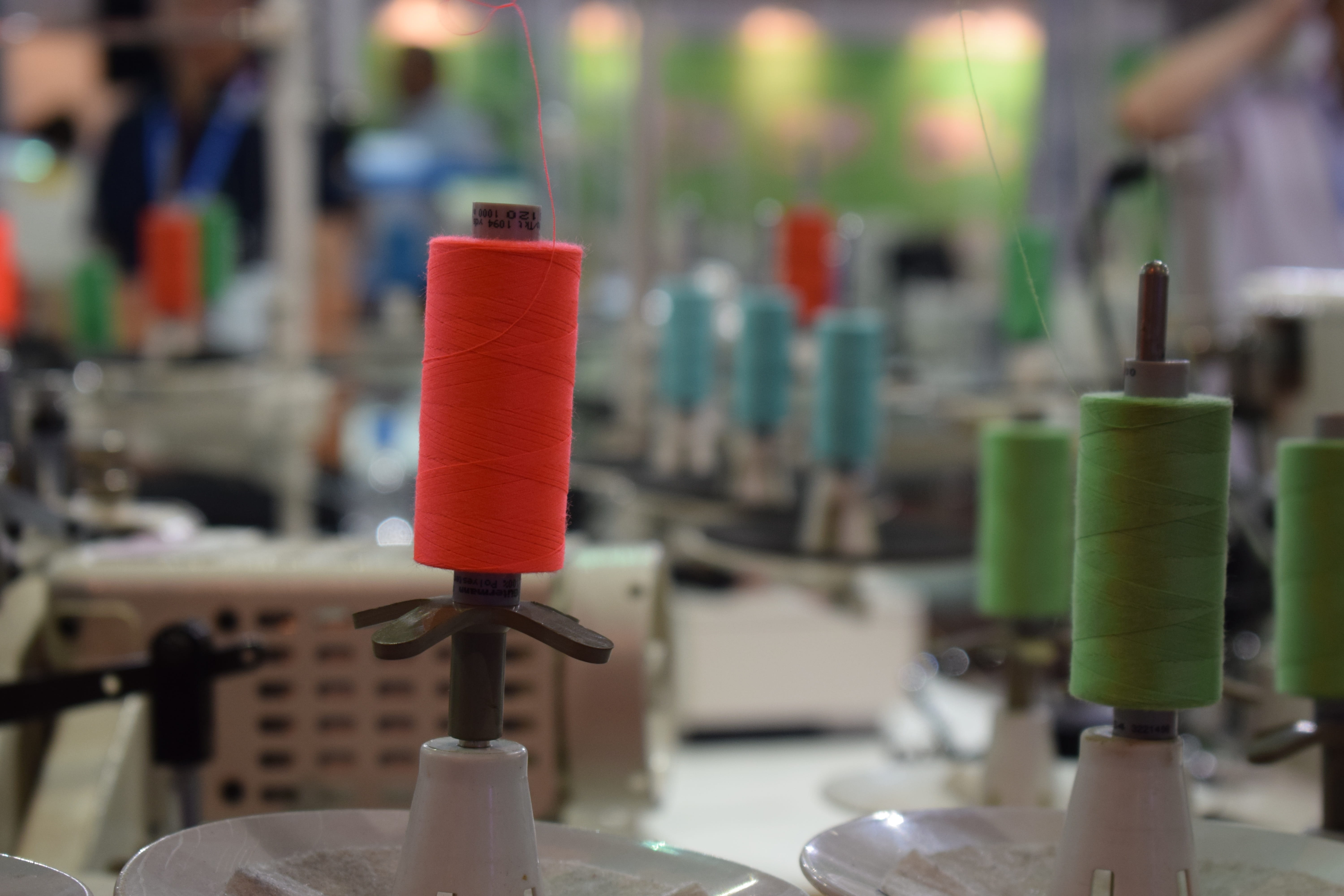 orange, thread, stitching, focus on foreground, close-up, spool