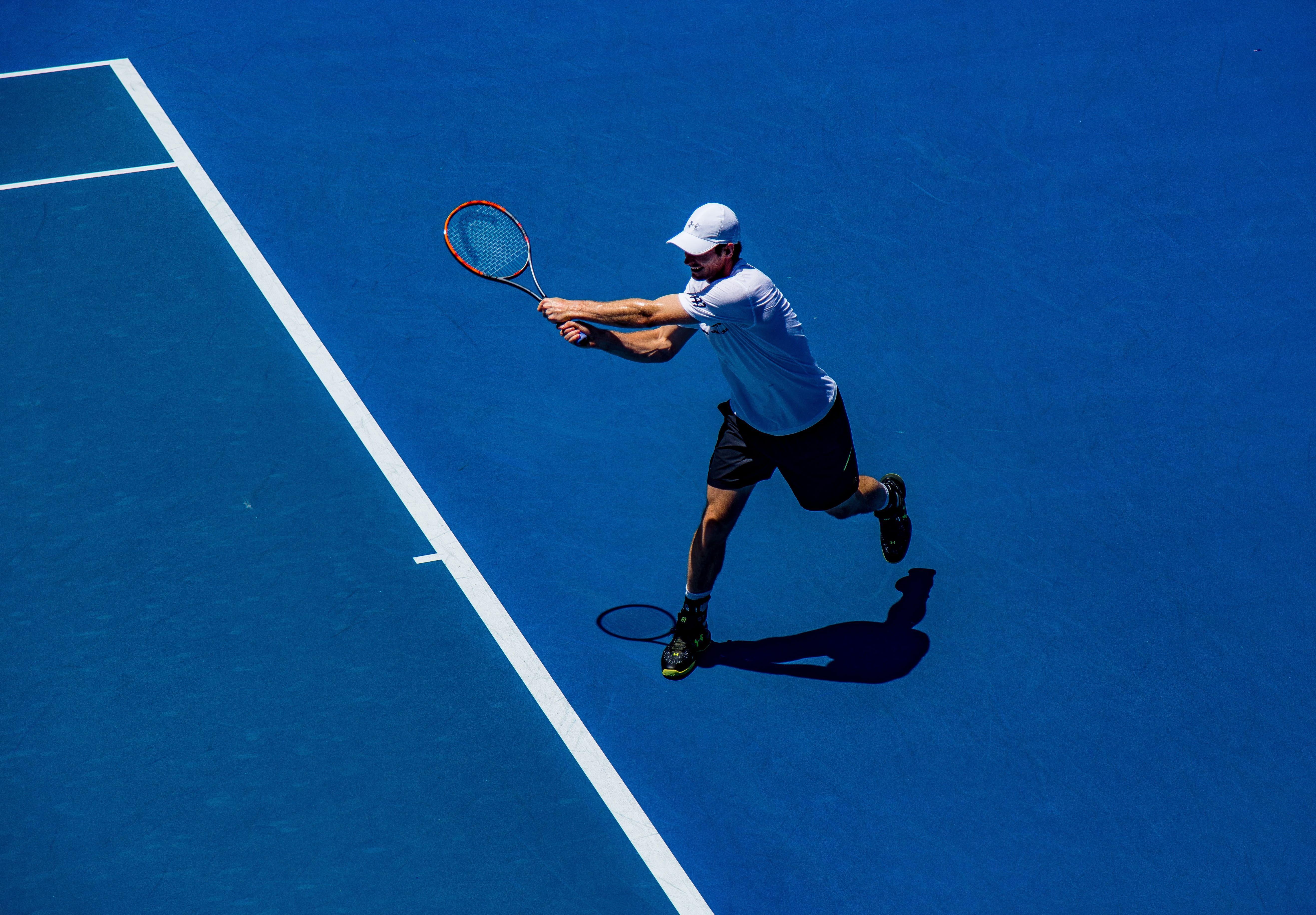 man in white shirt and black shorts playing tennis, sport, men