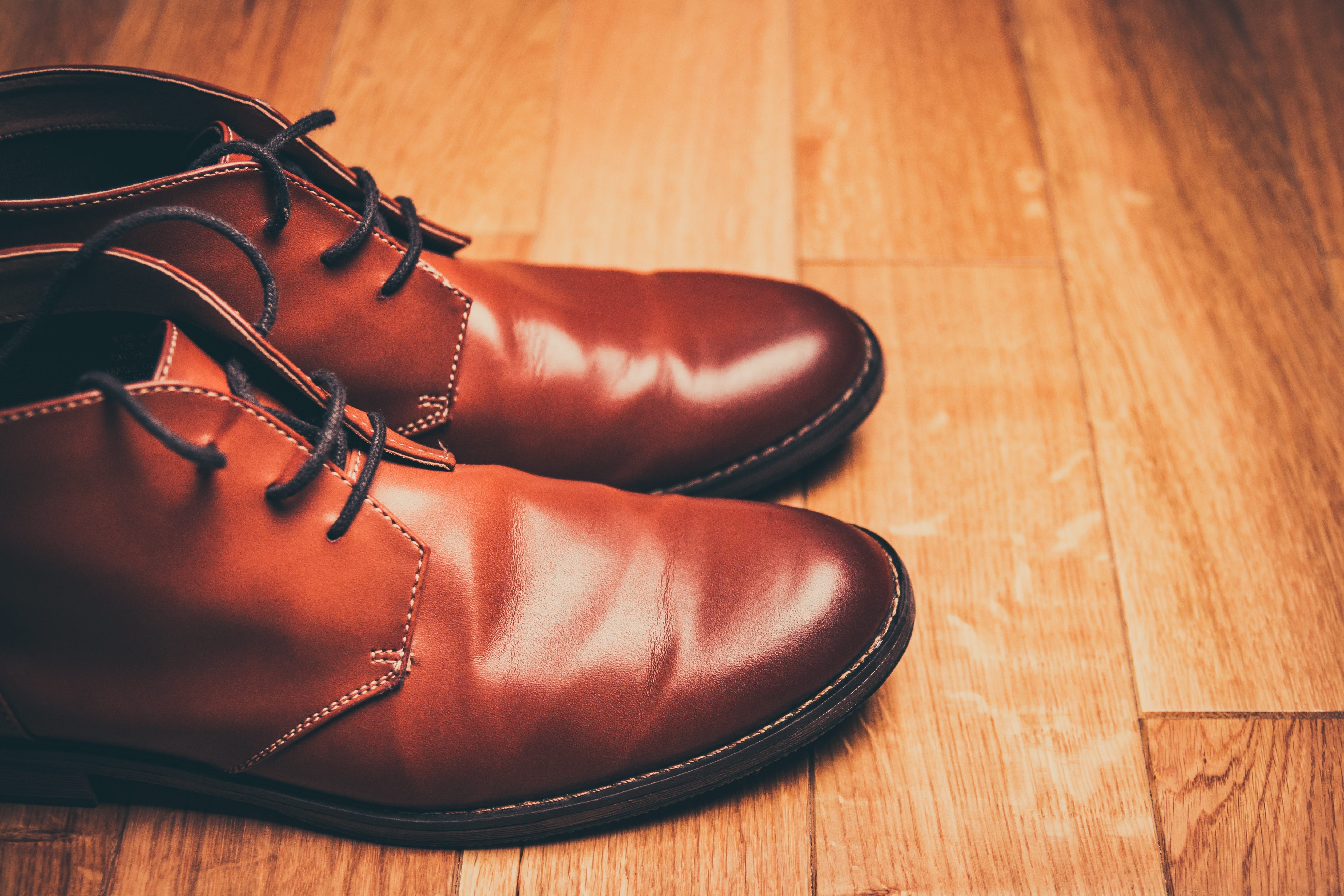 pair of brown leather chukka boots, brown shoes, lace-up shoes