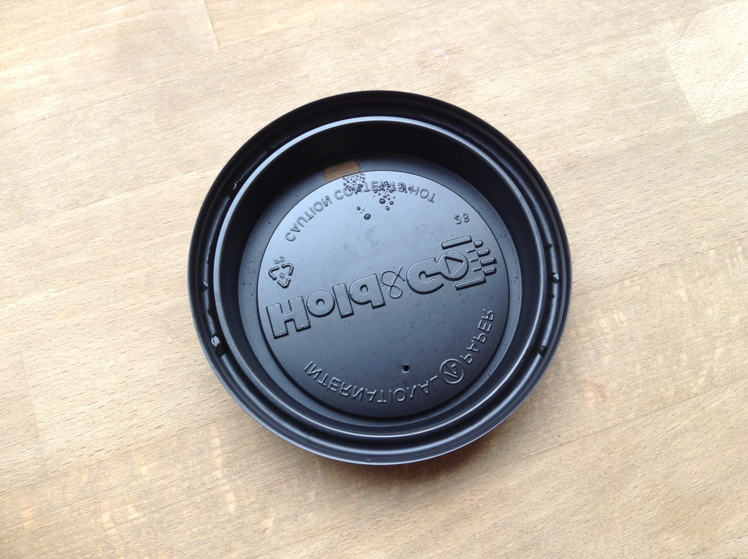 coffee, lid, plastic, shape, text, circle, table, geometric shape