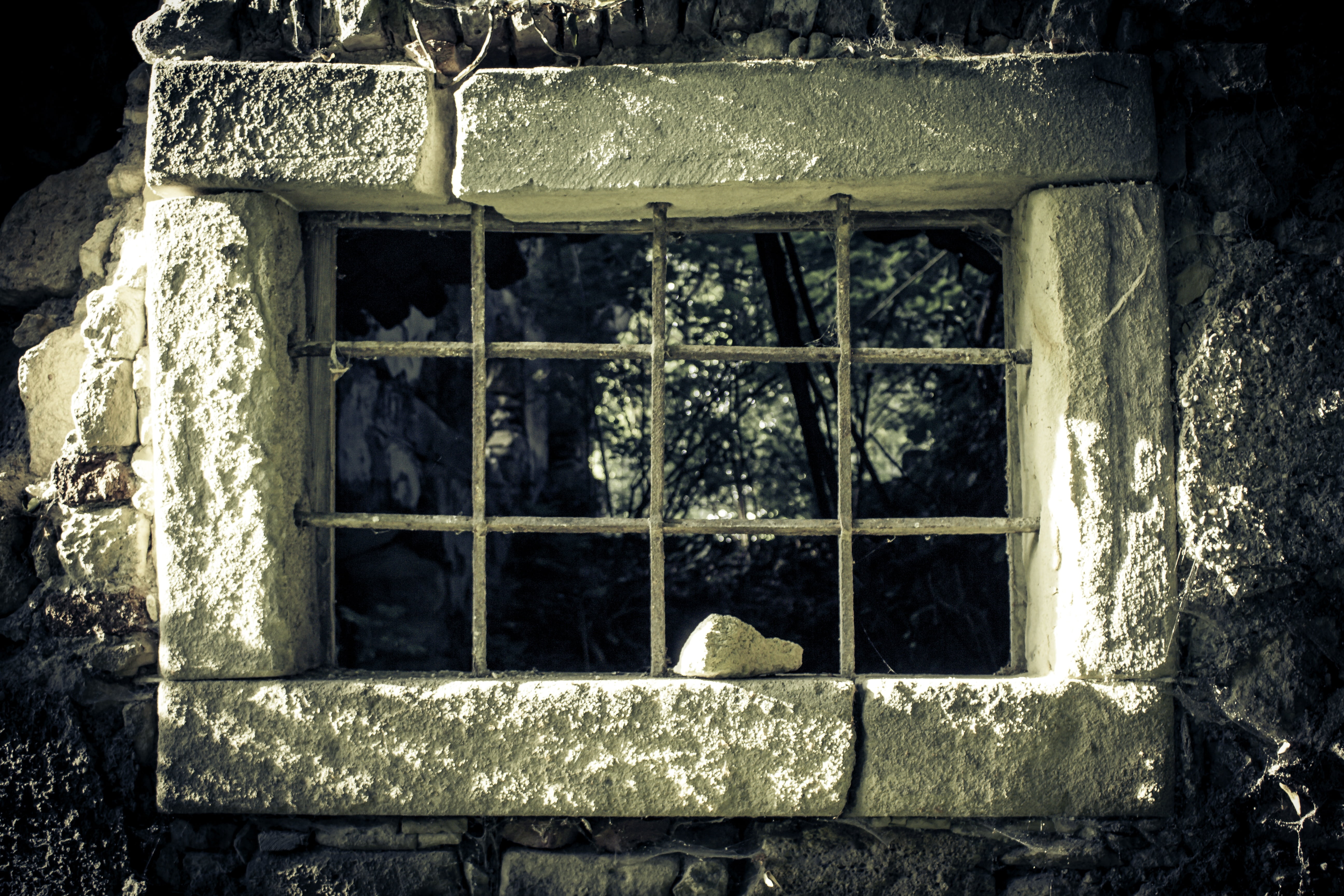 rectangular gray concrete window pane, prison, prison window