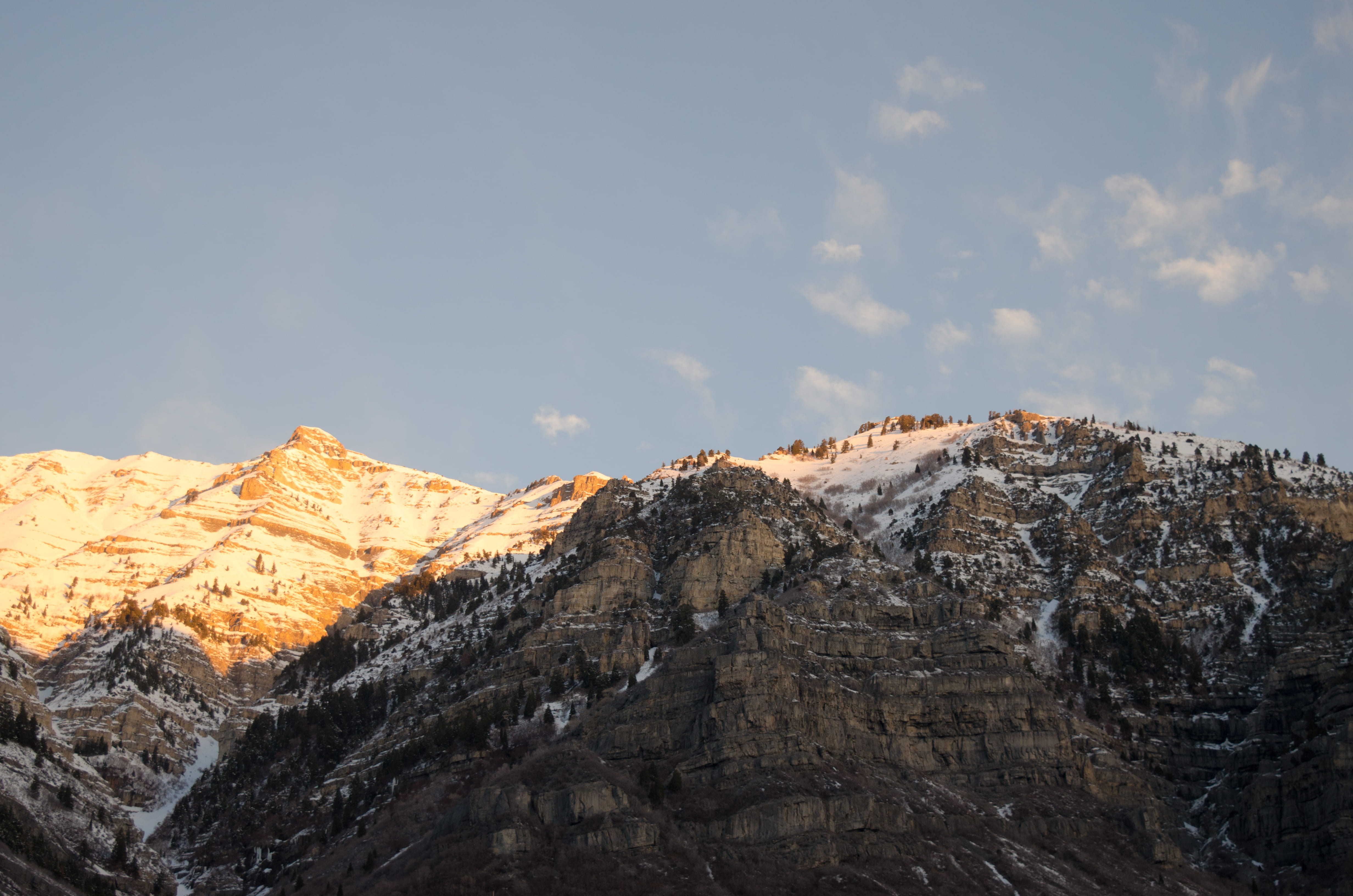 mountains under white clouds during daytime, snow filled mountain