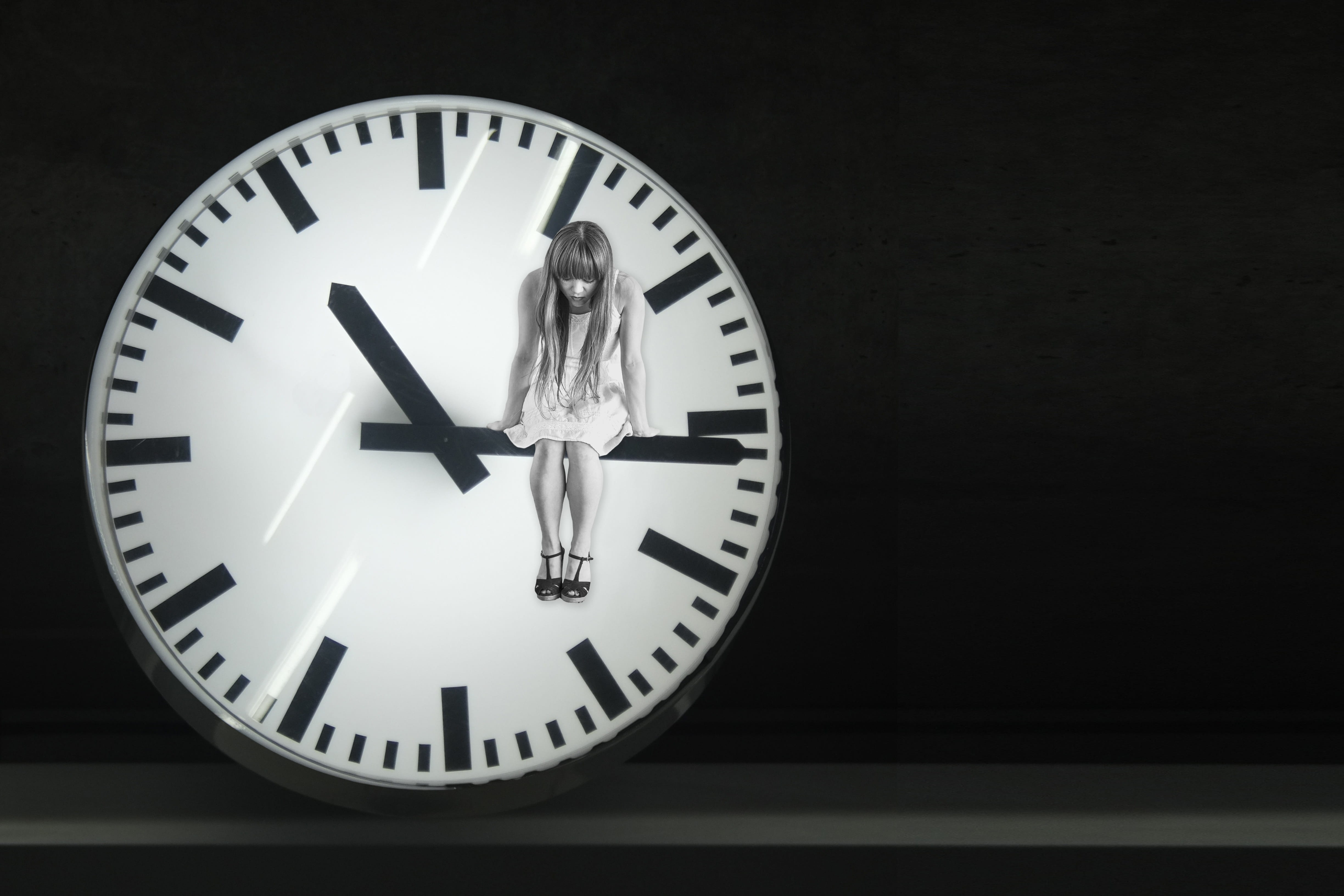 woman sitting on clock arm illustration, photography, hands, time