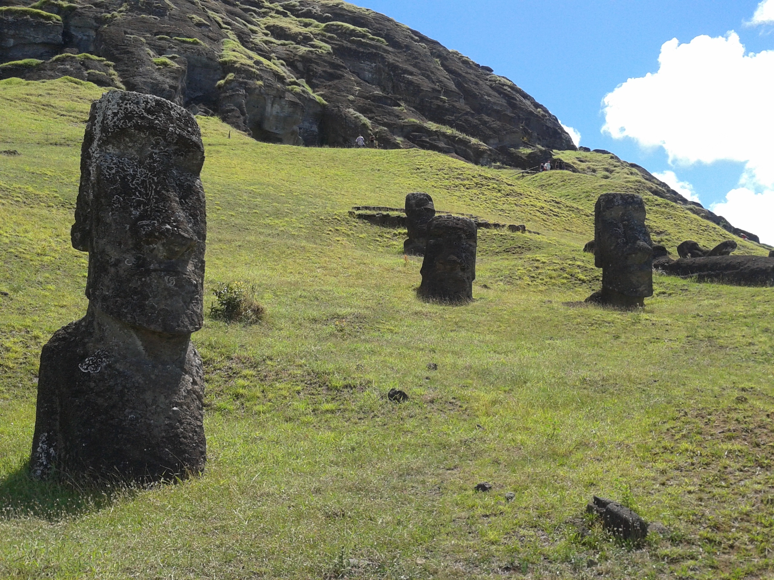 gray concrete heads monument at daytime, rapa, nui, easter island