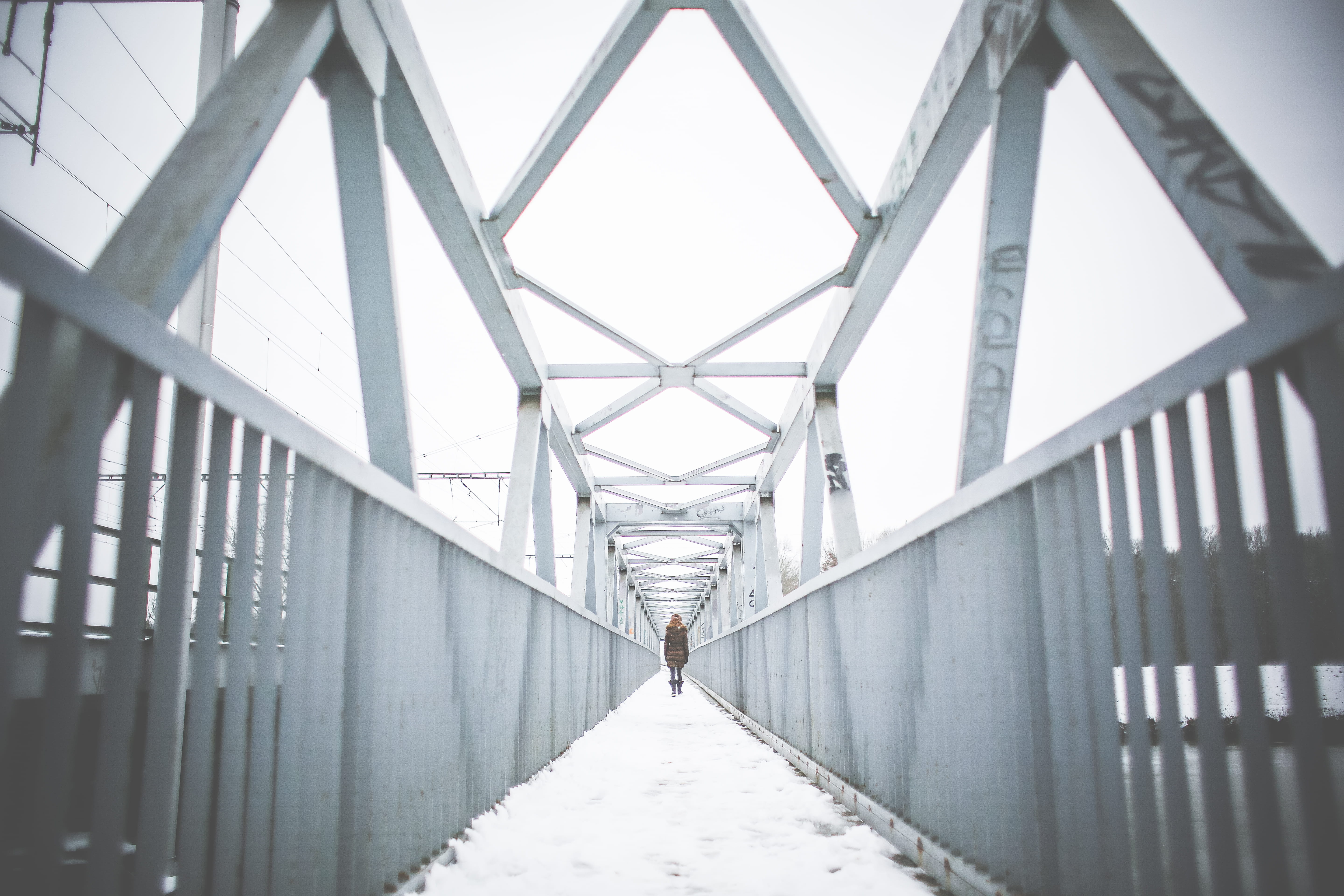 Girl Walking on Steel Bridge in Winter, cold, iron, minimalistic