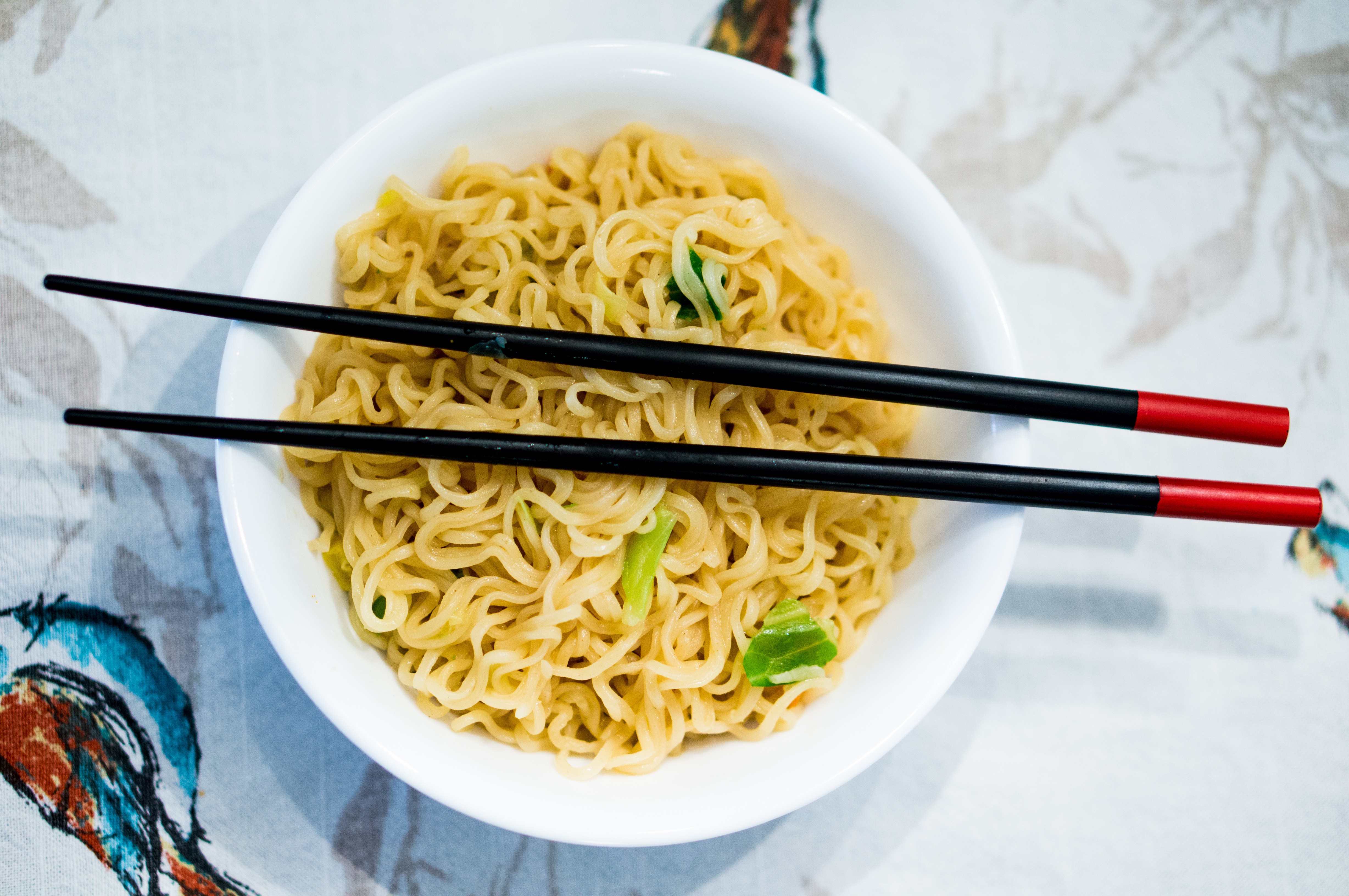 noodles in white ceramic bowl and black chopsticks, food, ramen