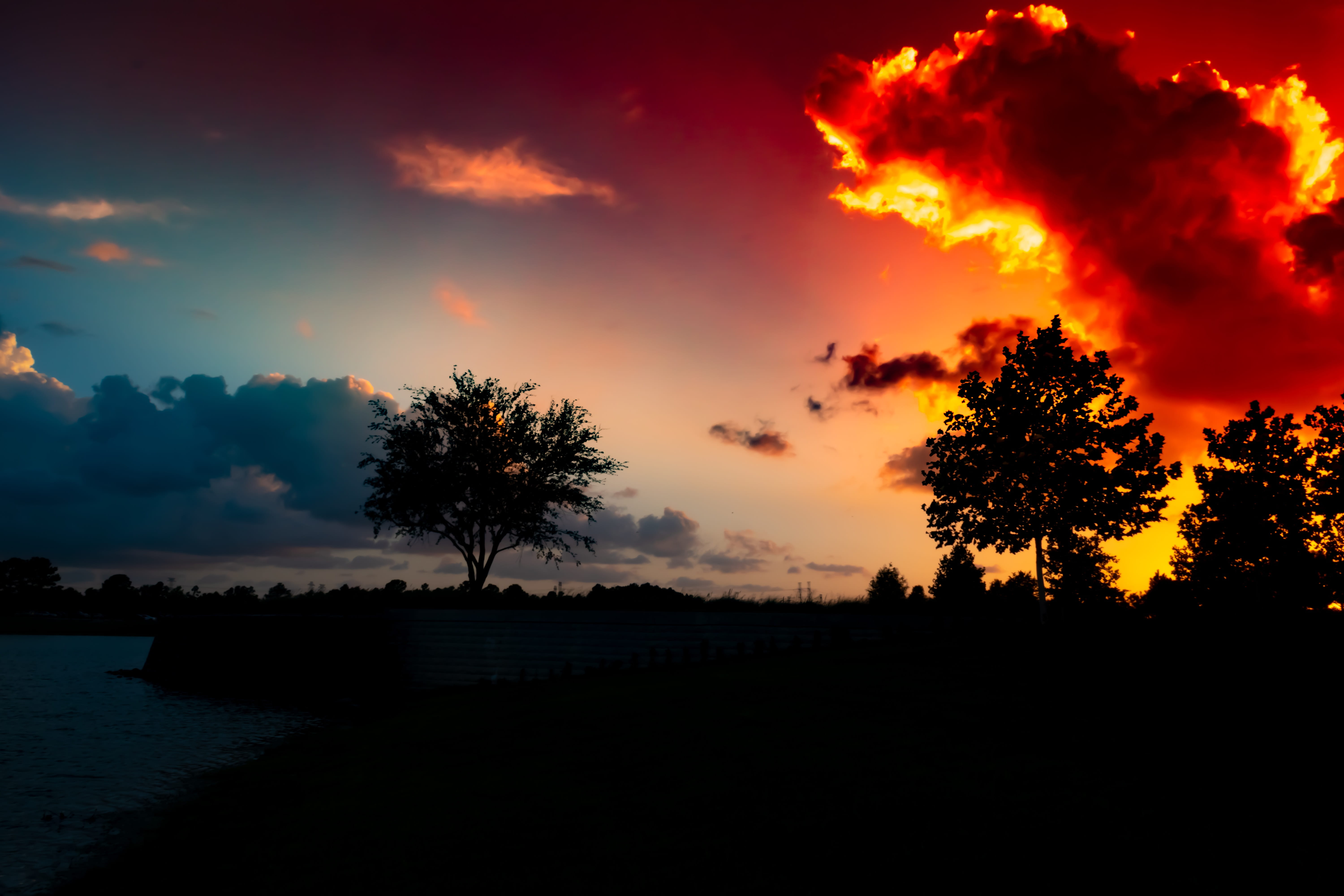 sunset, glowing red clouds, dramatic, sky, blue, bright, yellow