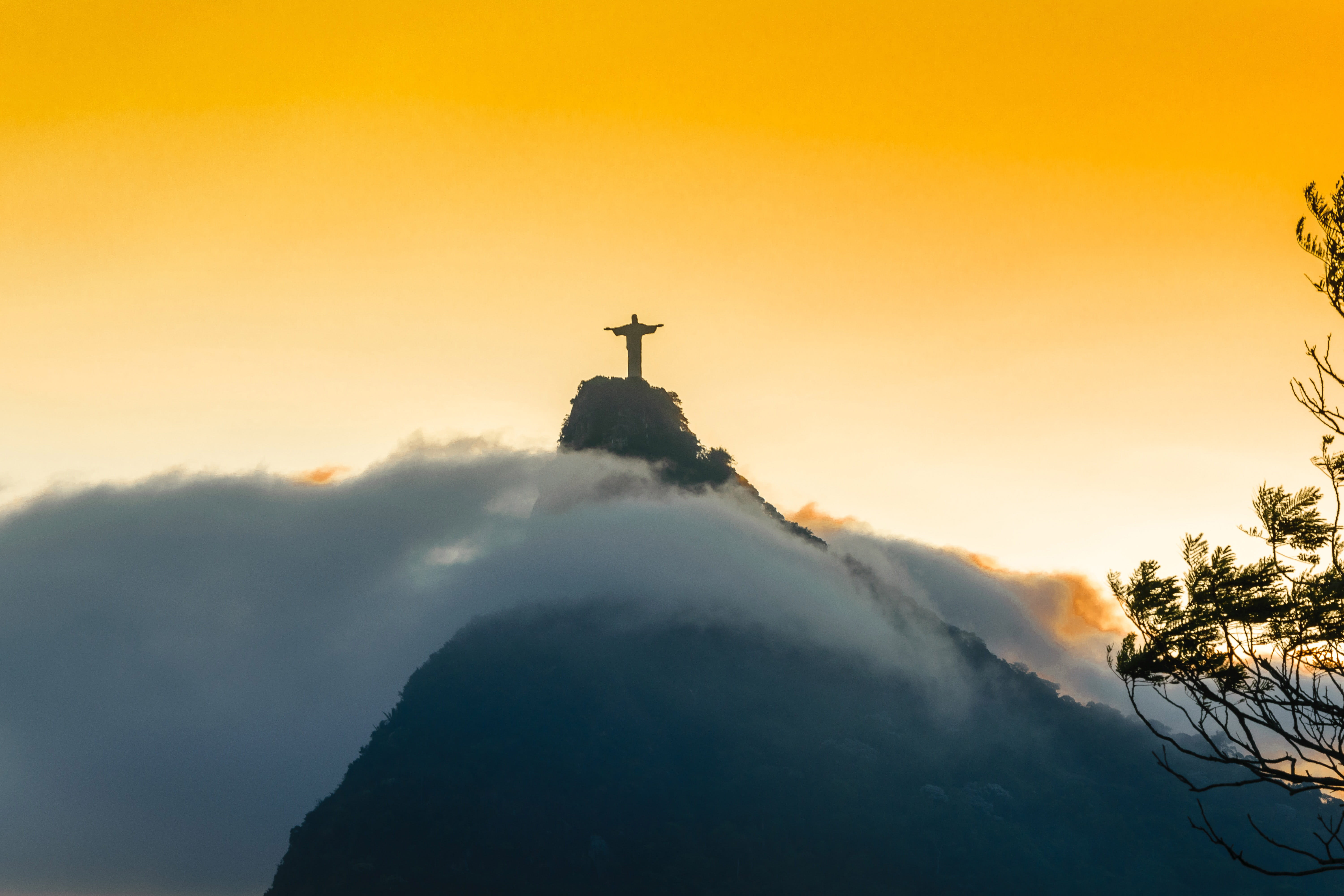 Sunset and dusk over the Christ Statue in Rio De Janeiro, Brazil