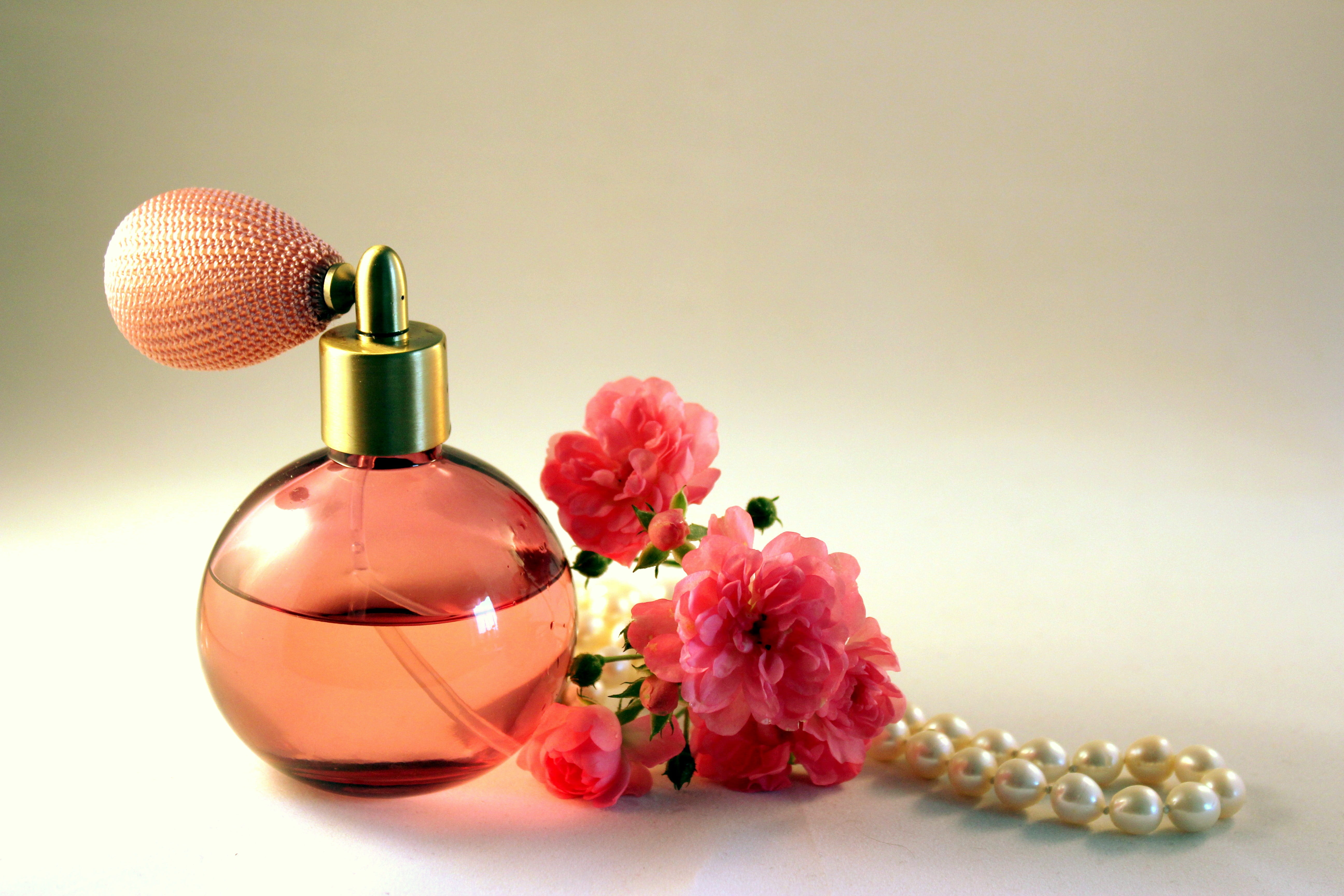 pink glass fragrance bottle, perfume, roses, still life, glass bottle