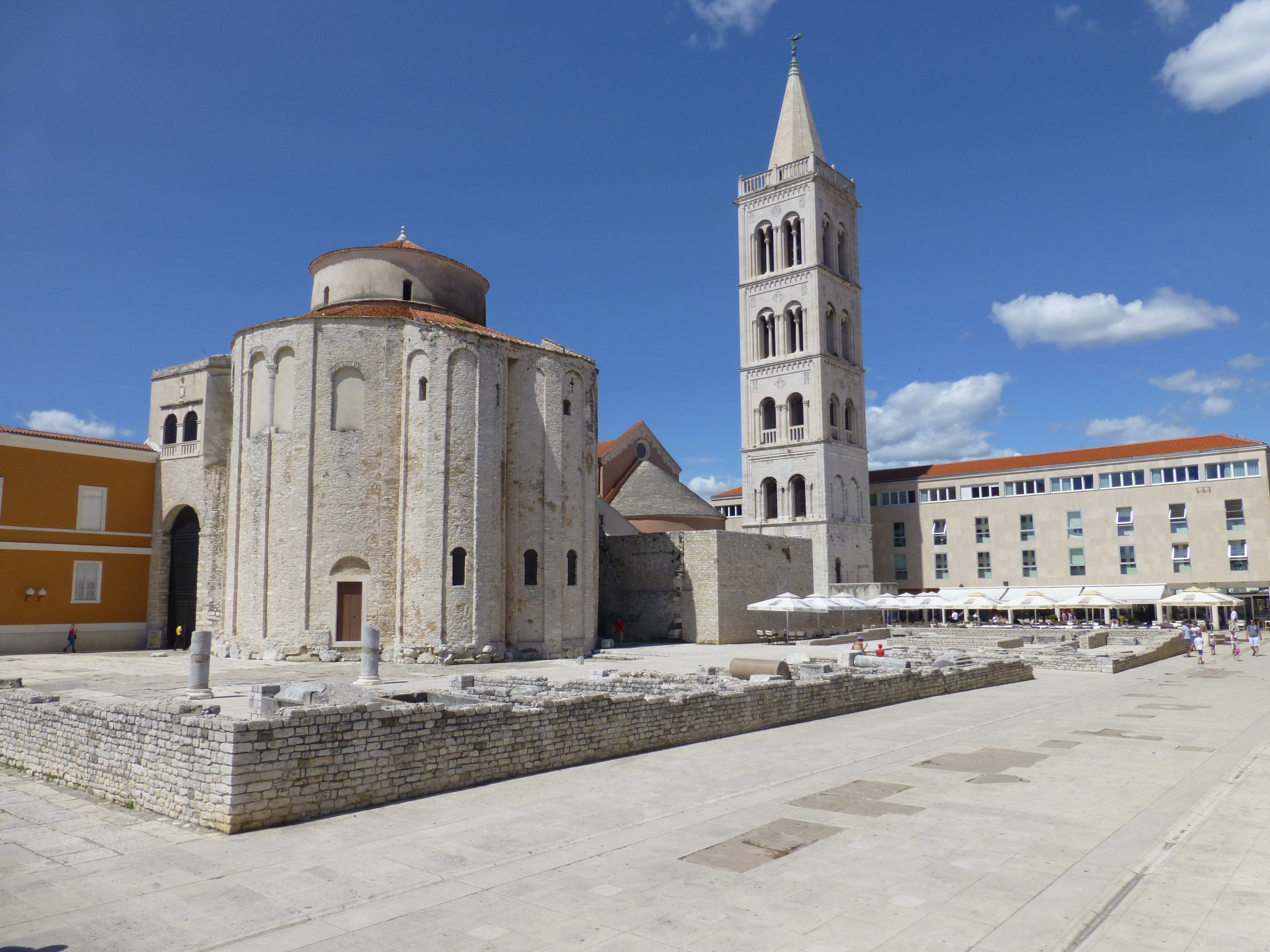 white concrete landmark under blue sky, zadar, croatia, dalmatia