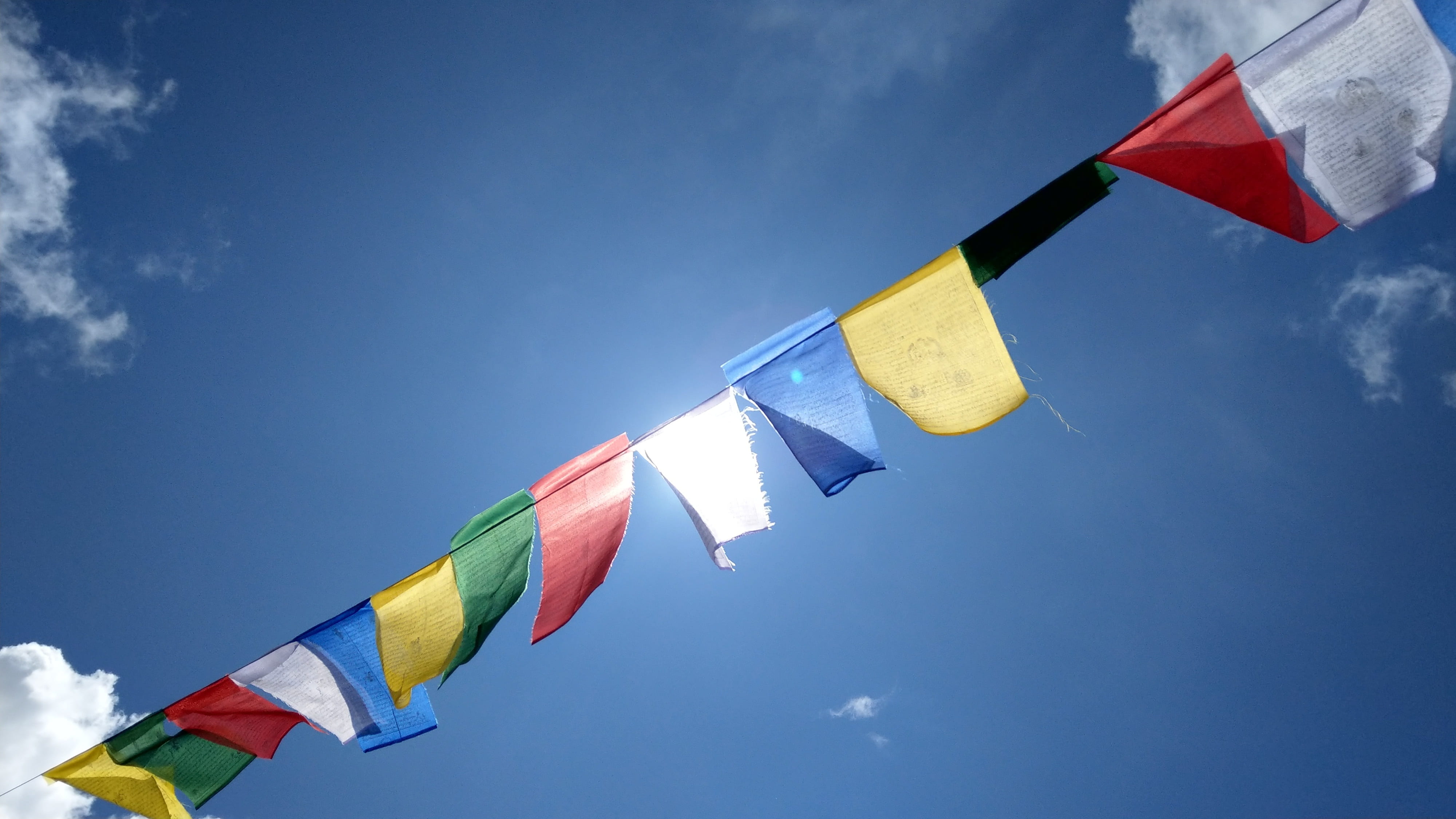 assorted-color flags, tibetan buddhism, nepal, colored flag, sky