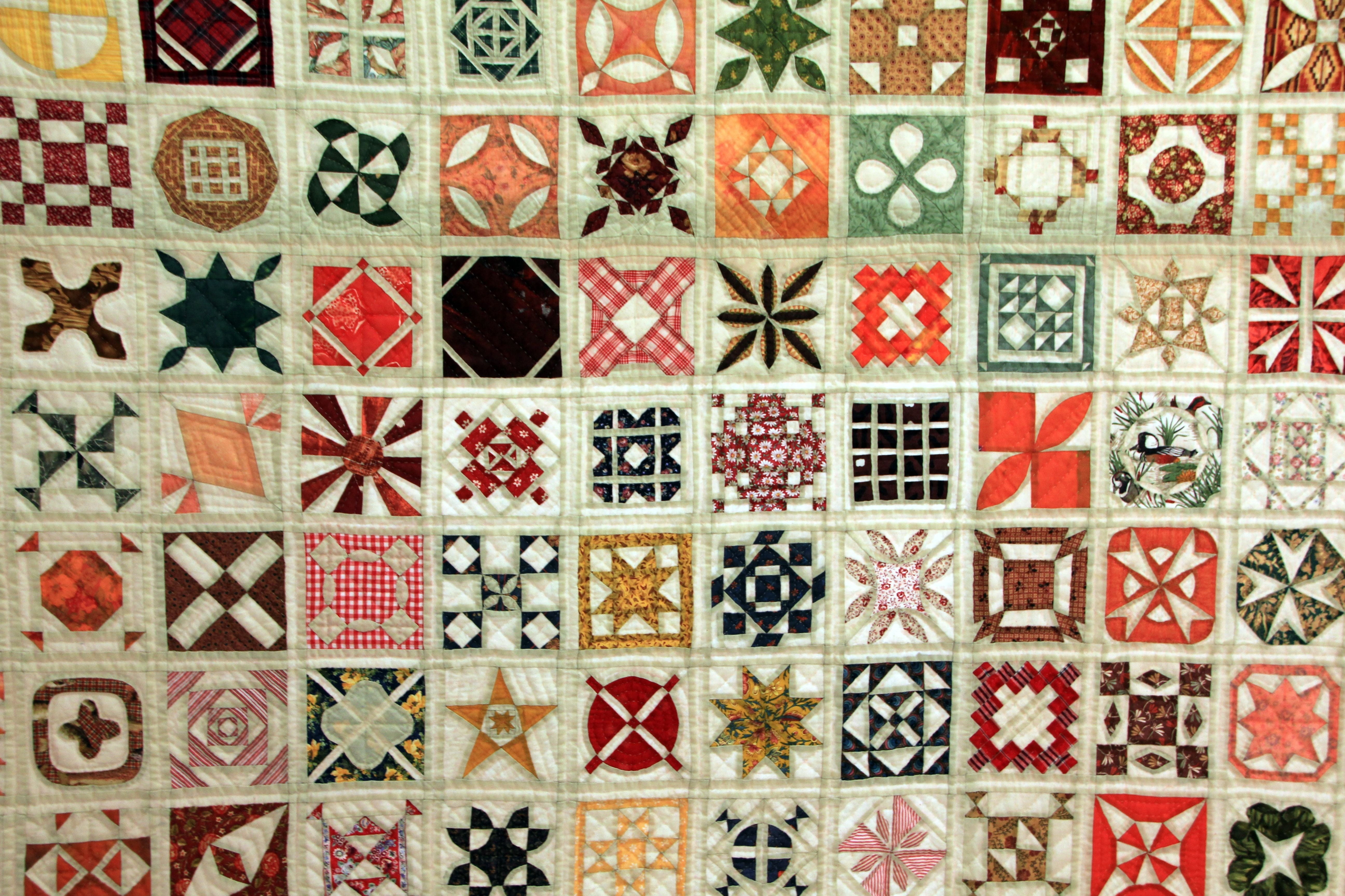multicolored floral textile, hand labor, sew, patchwork, pattern