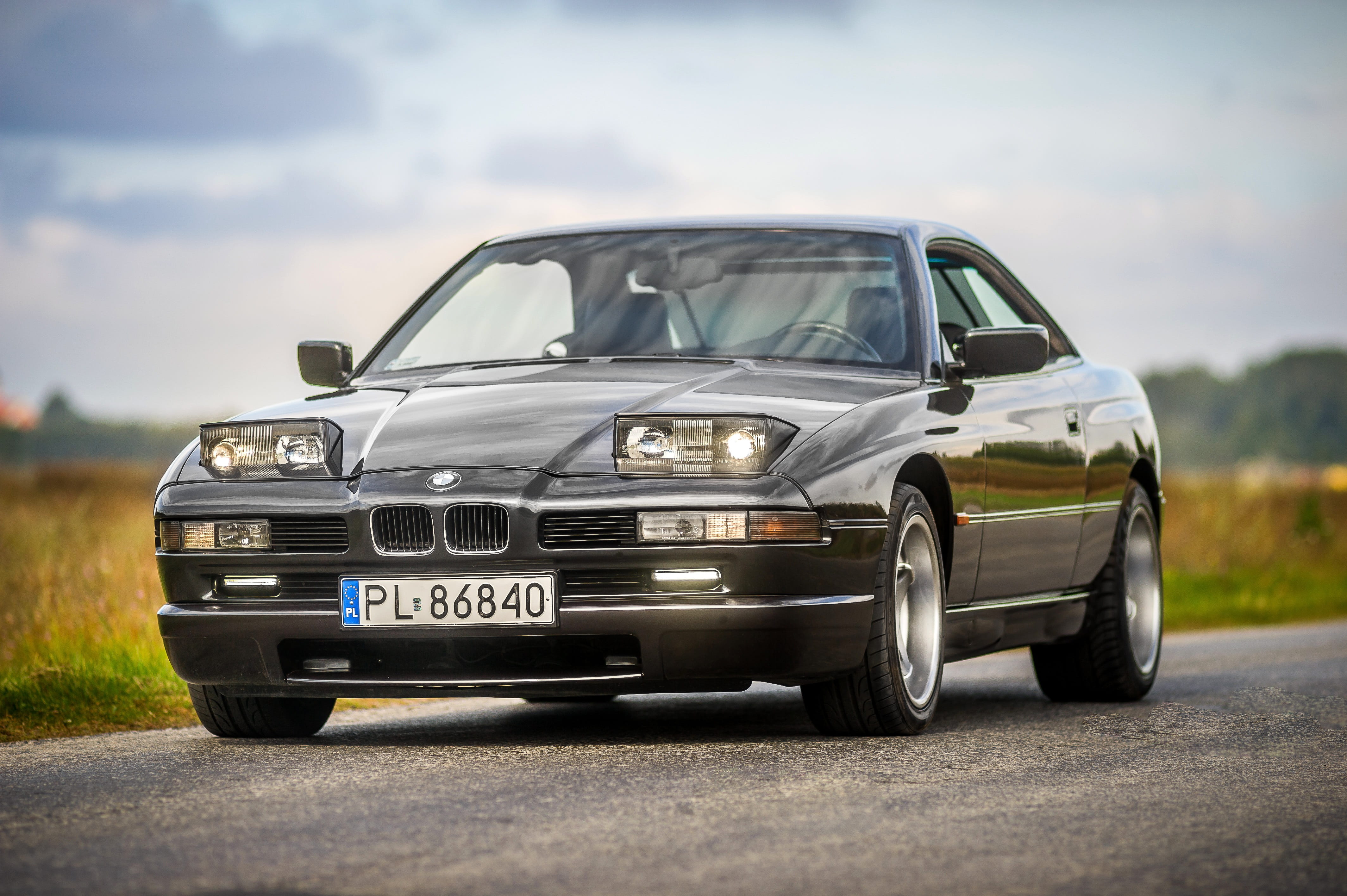 selective focus photography of gray BMW coupe, e31, 8 series