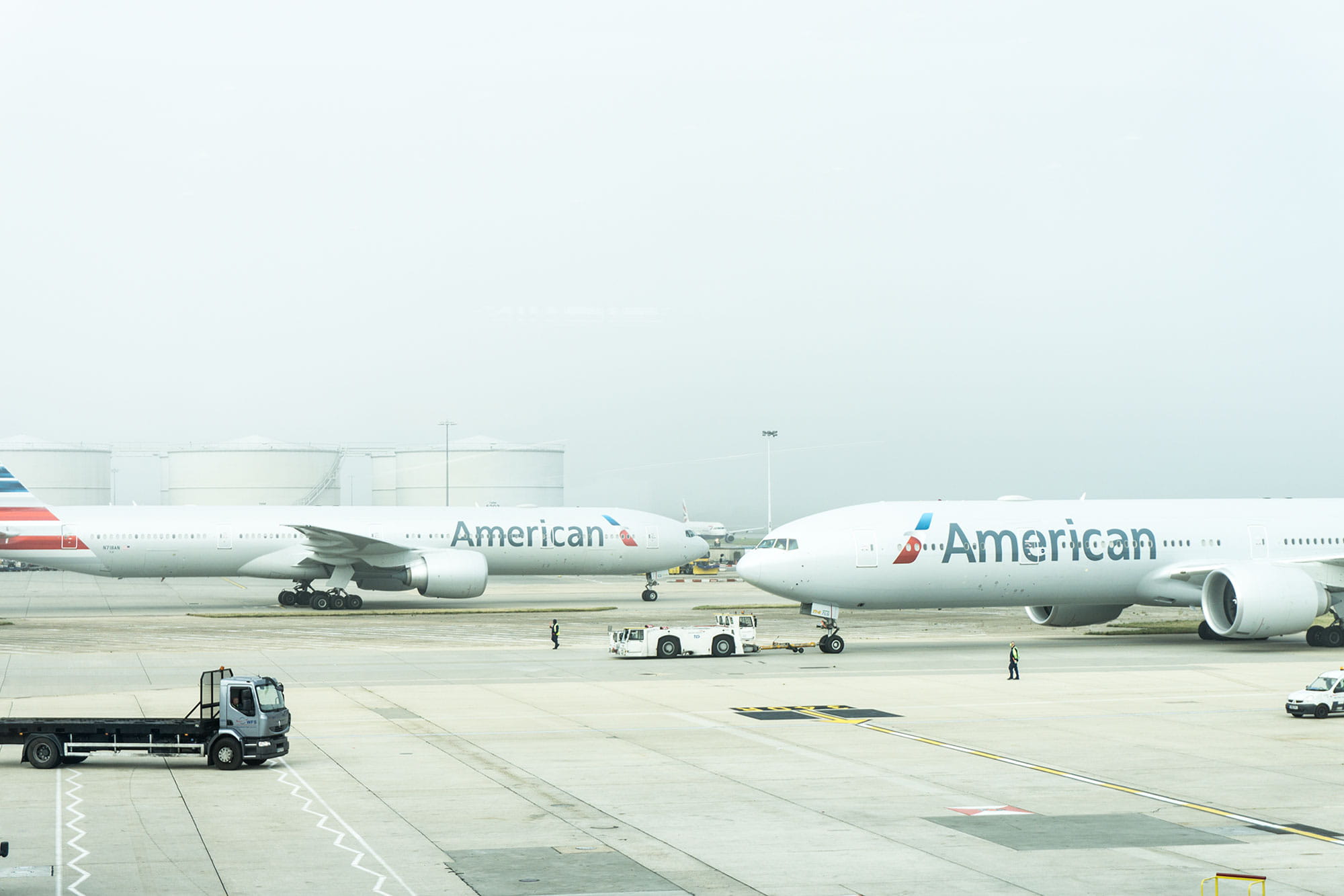 two American Airlines planes on airport, two American airliner on airport