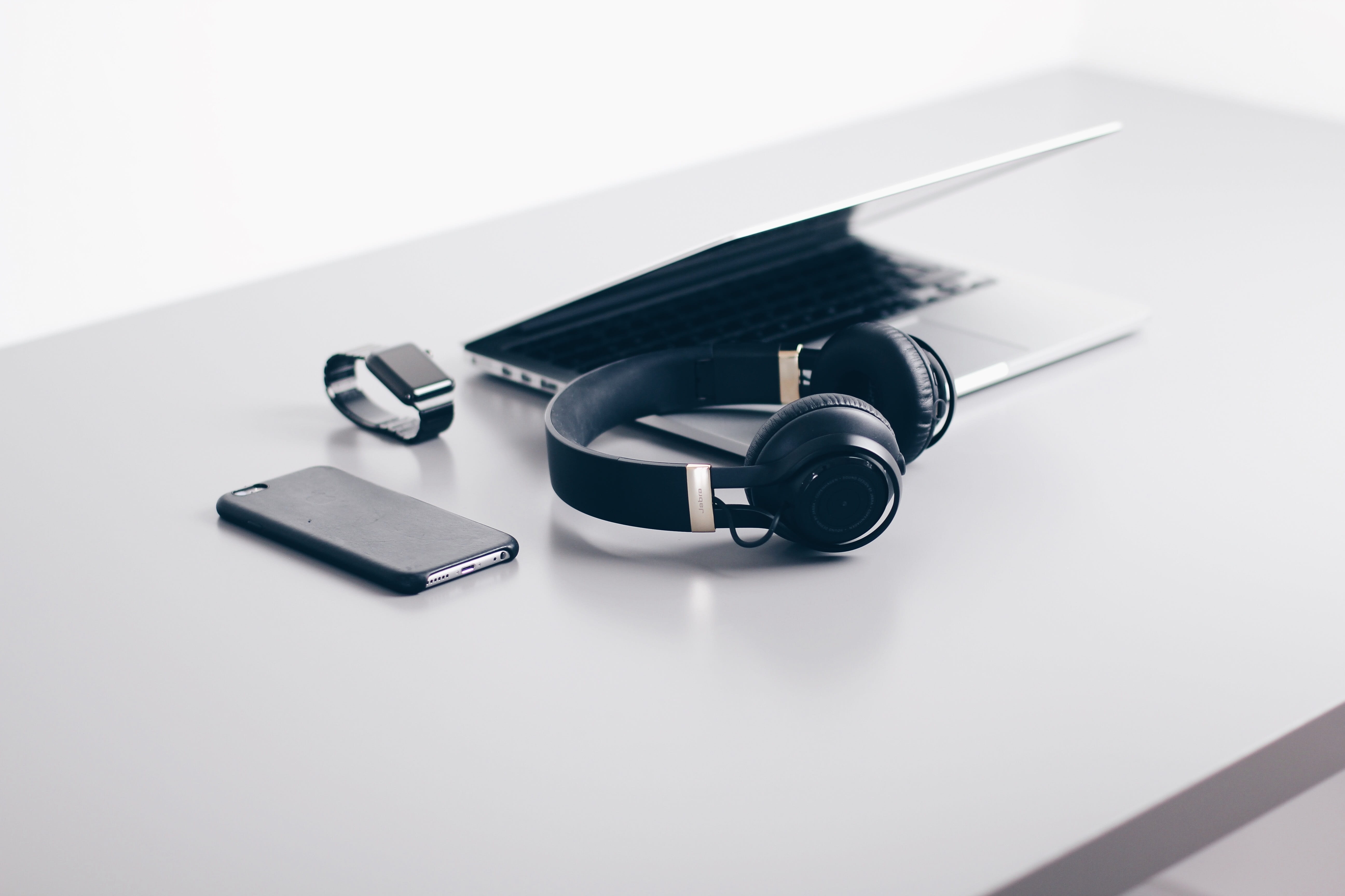 white laptop computer beside headphones, browser, research, study