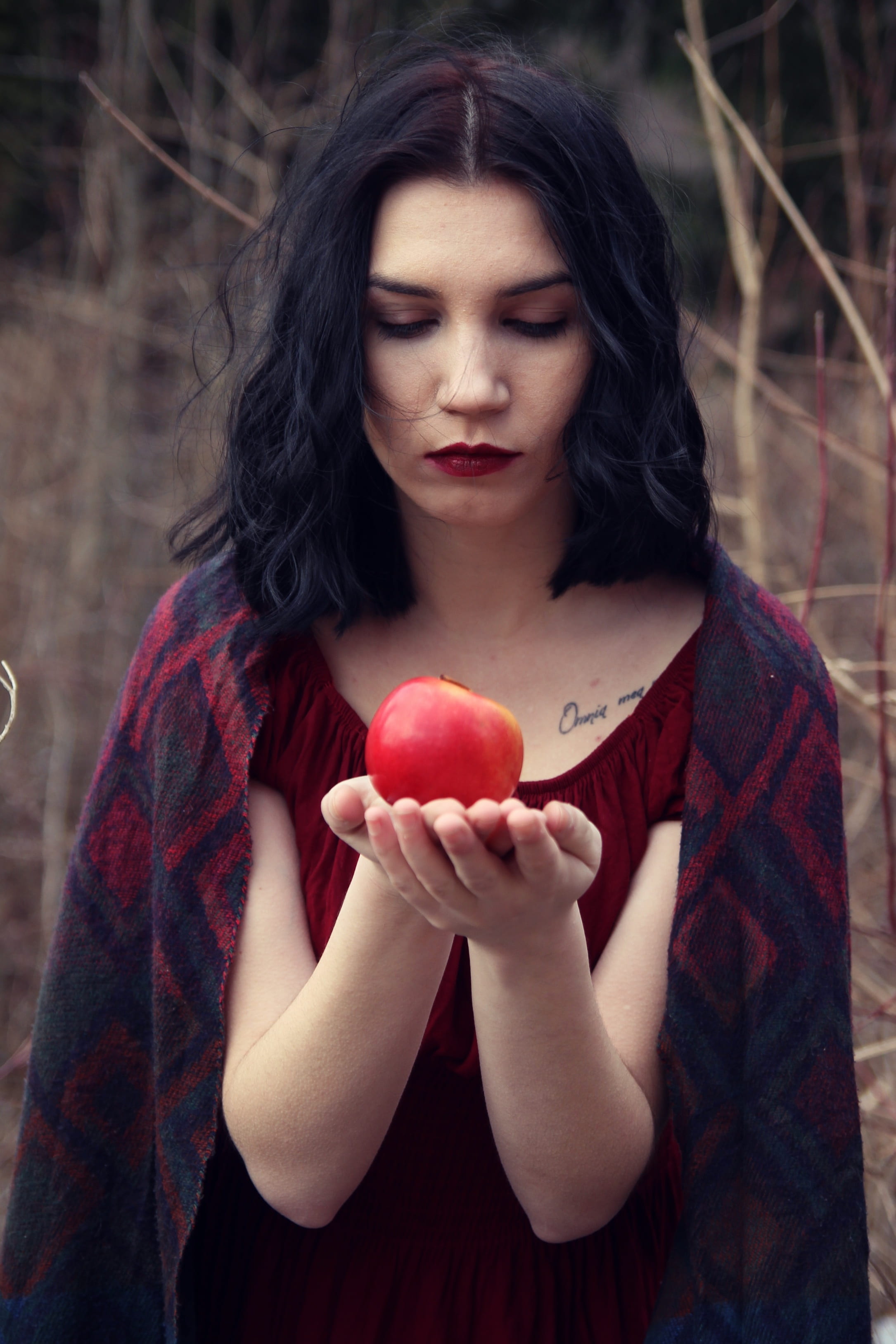 Free Download Hd Wallpaper Woman In Red Top Holding Apple During Daytime Girl Wild Scarf 6249