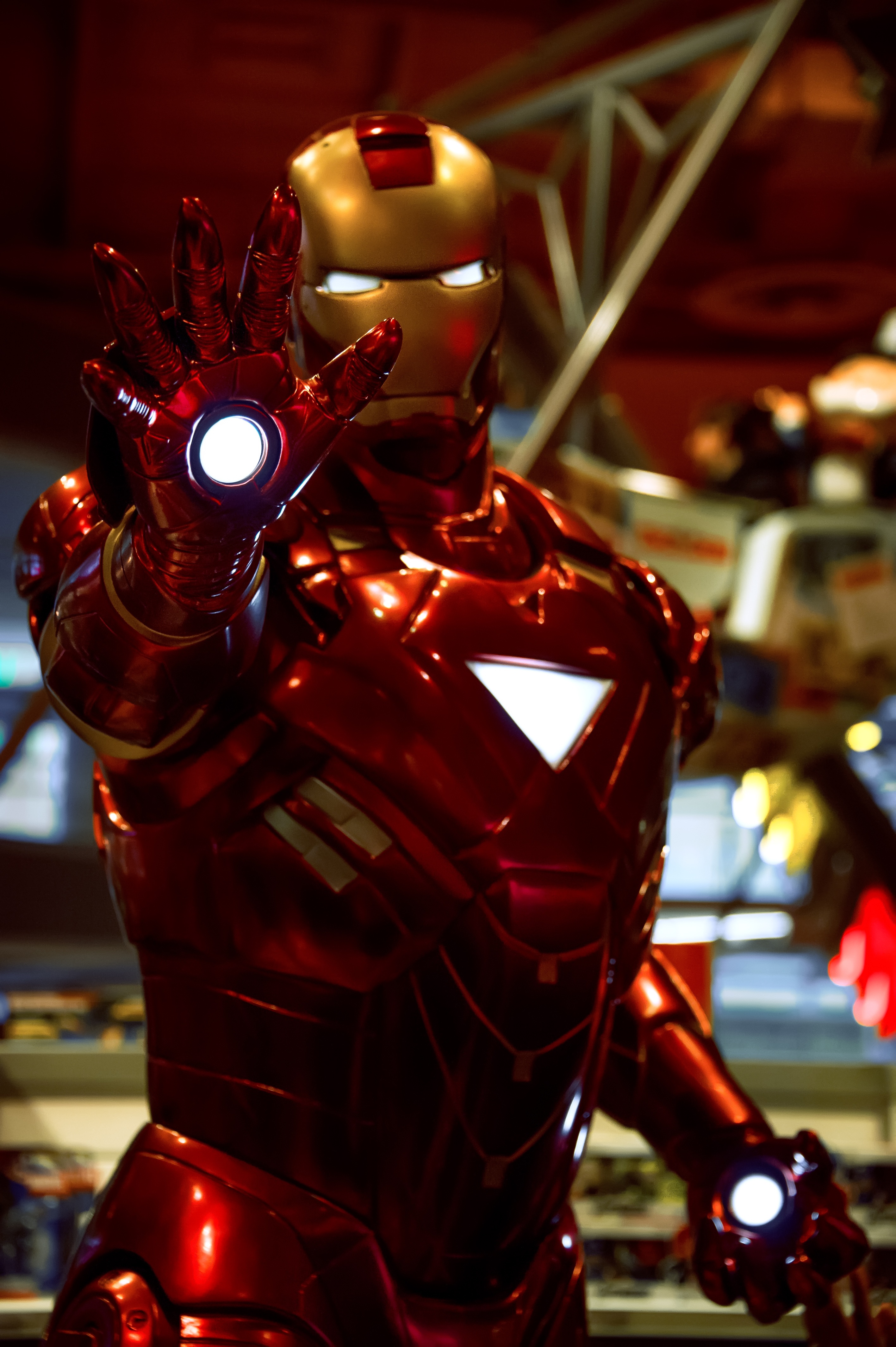 Iron Man statue, ironman, hero, comic, focus on foreground, illuminated