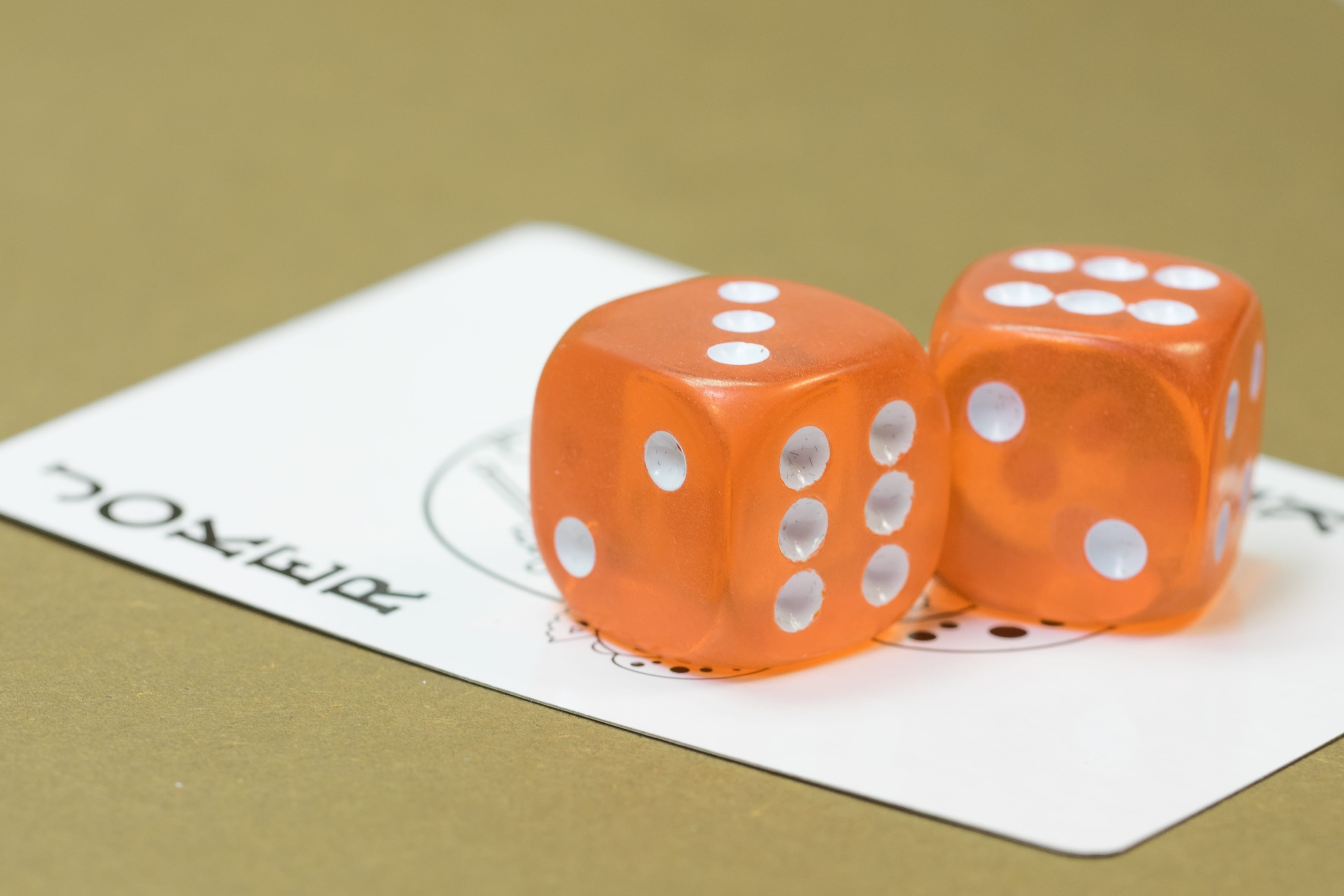 two orange dices on top of joker game card, Map, Joker, Playing Card