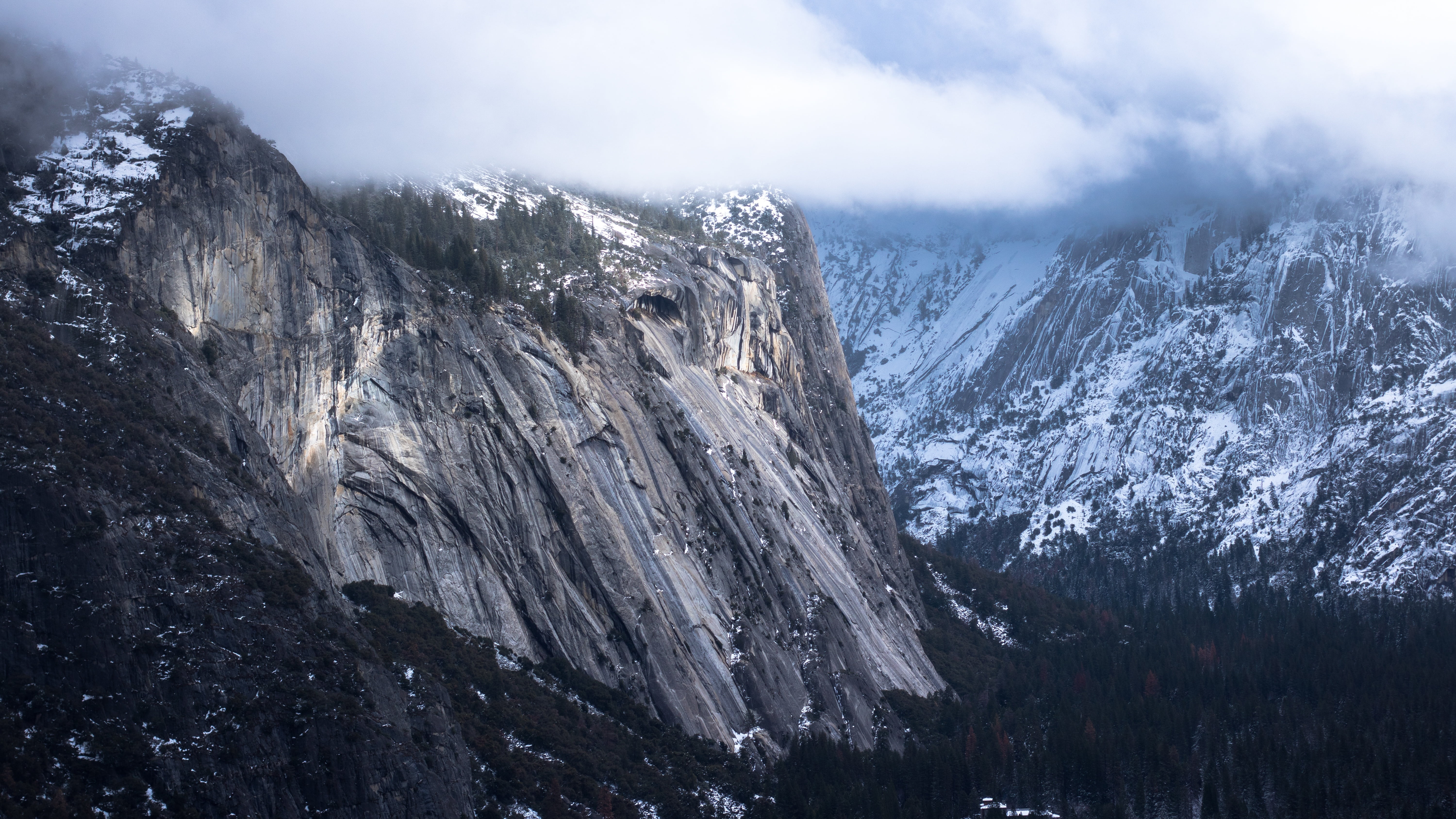 gray and white mountains under white clouds during daytime, cliffs