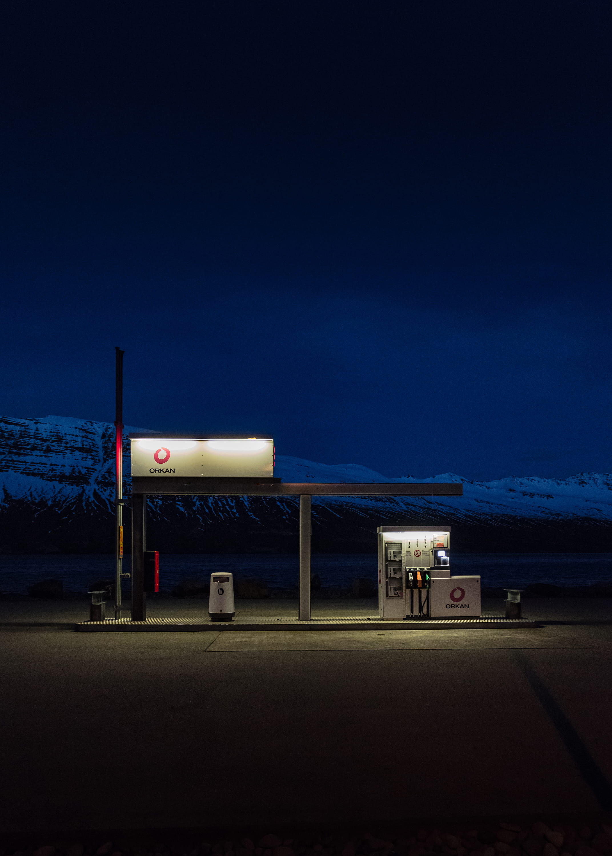 gasoline station during nighttime, turned-on lights on gas station