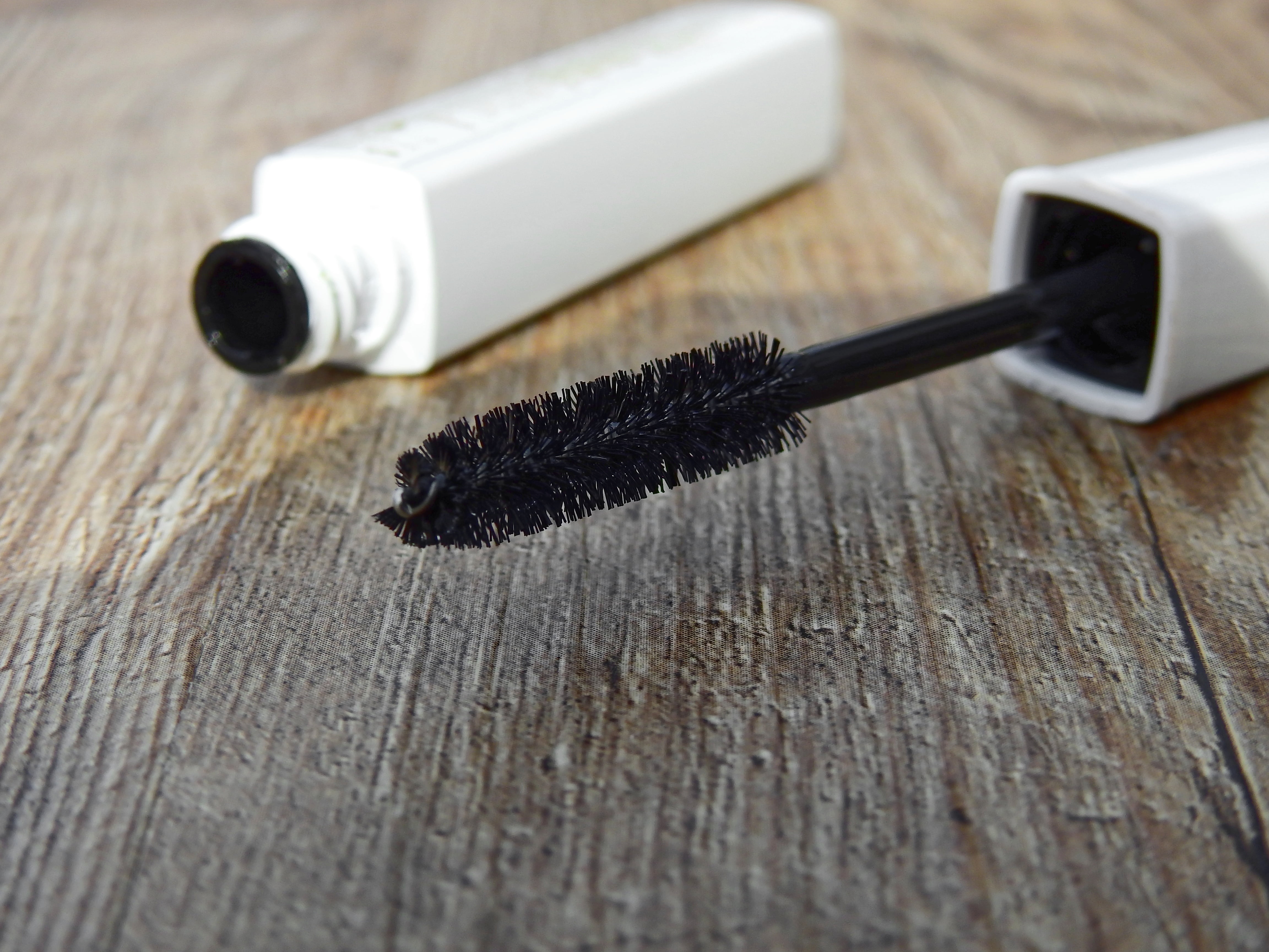 black mascara with white container, cosmetics, make up, makeup