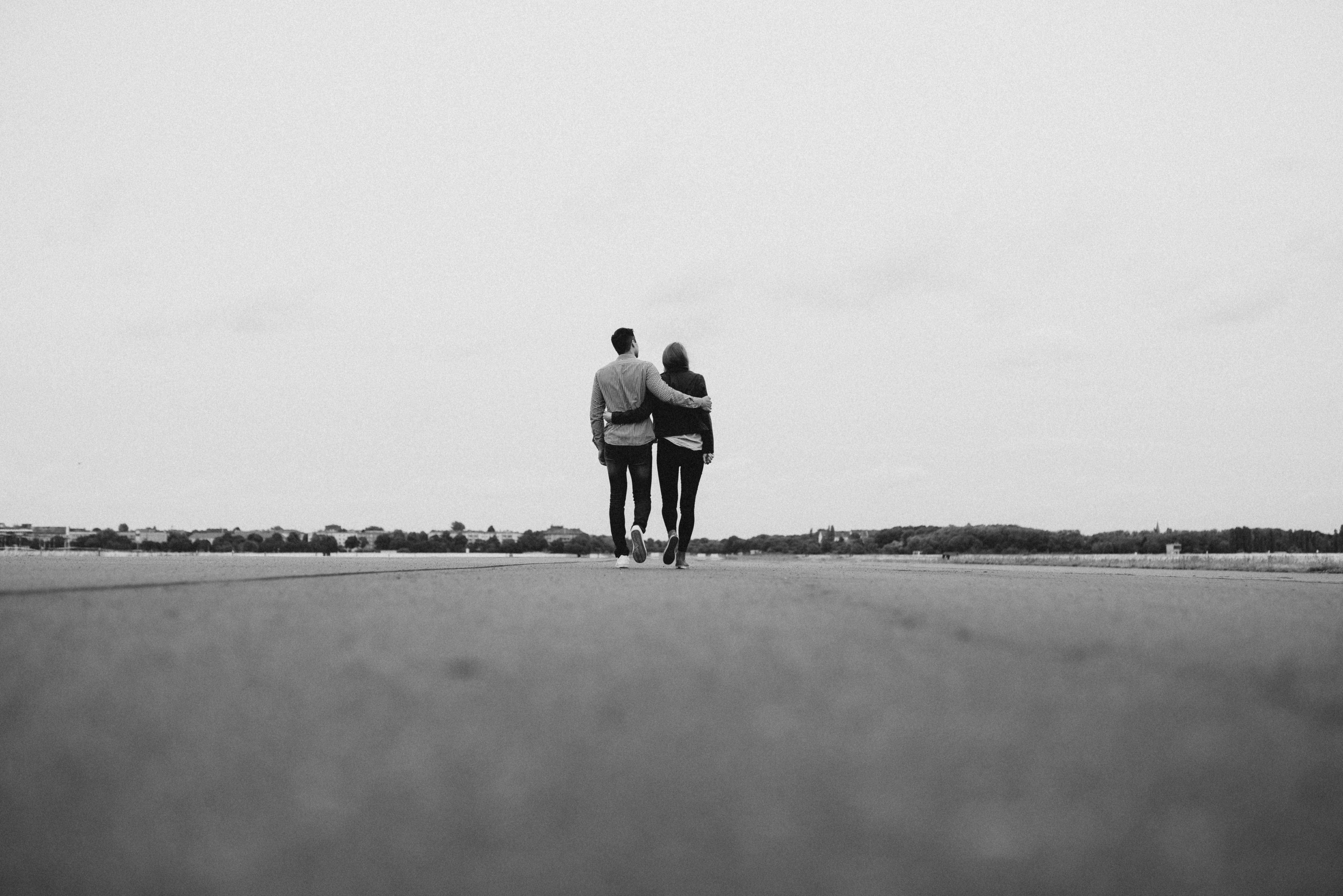 Walk the streets, man and woman walking on pathway, outdoors