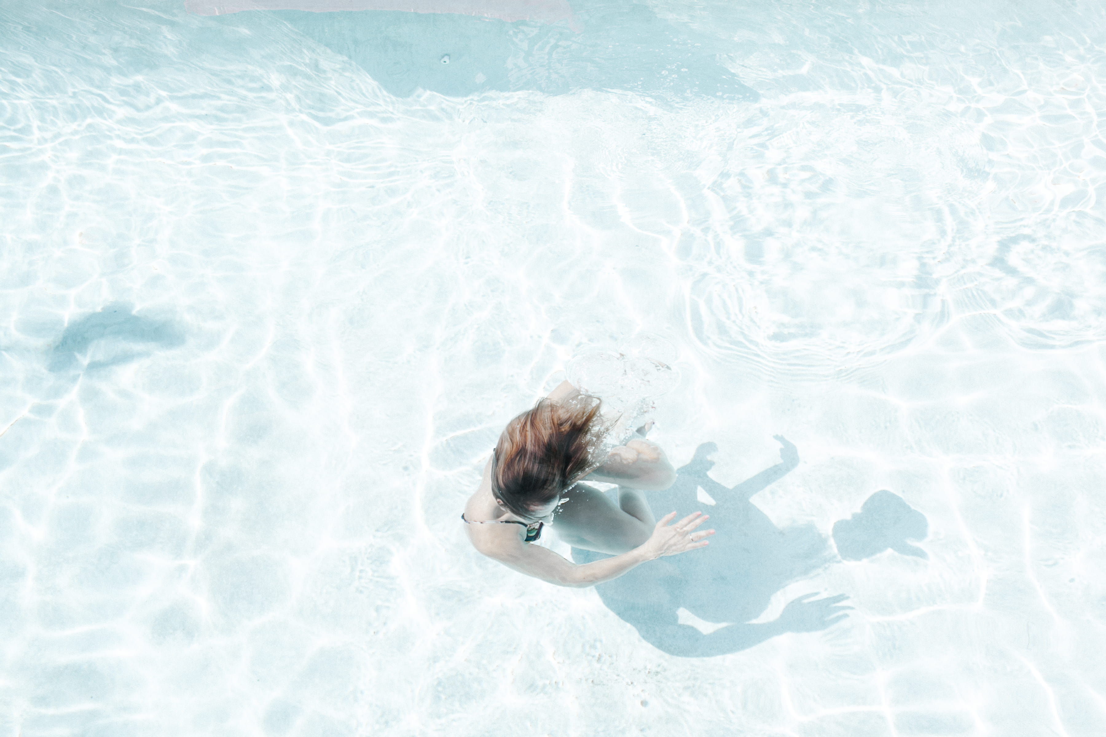 Underwater, woman swimming on body of water, pool, clear, one Person
