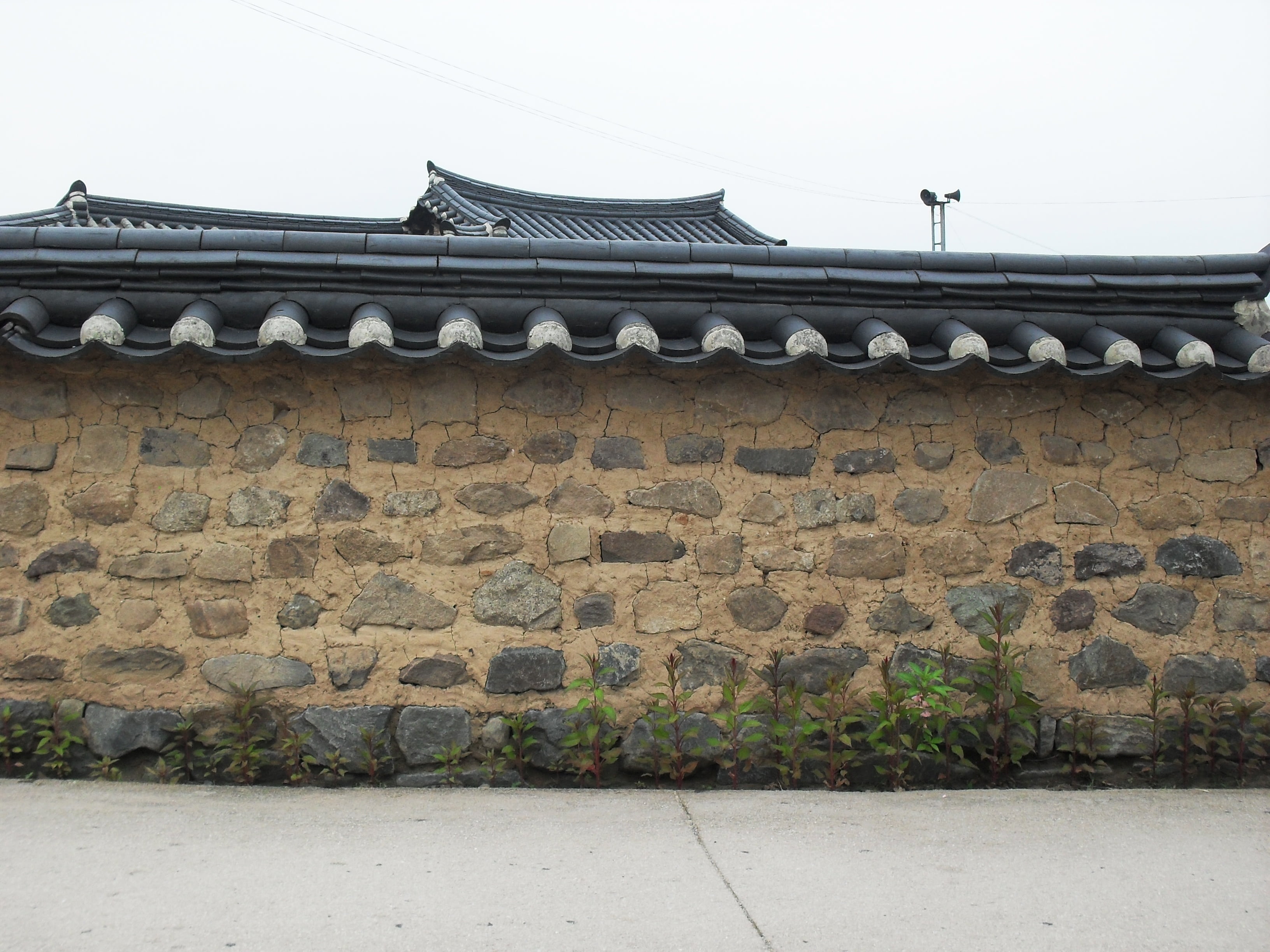 brown and black concrete house at daytime, hanok, republic of korea