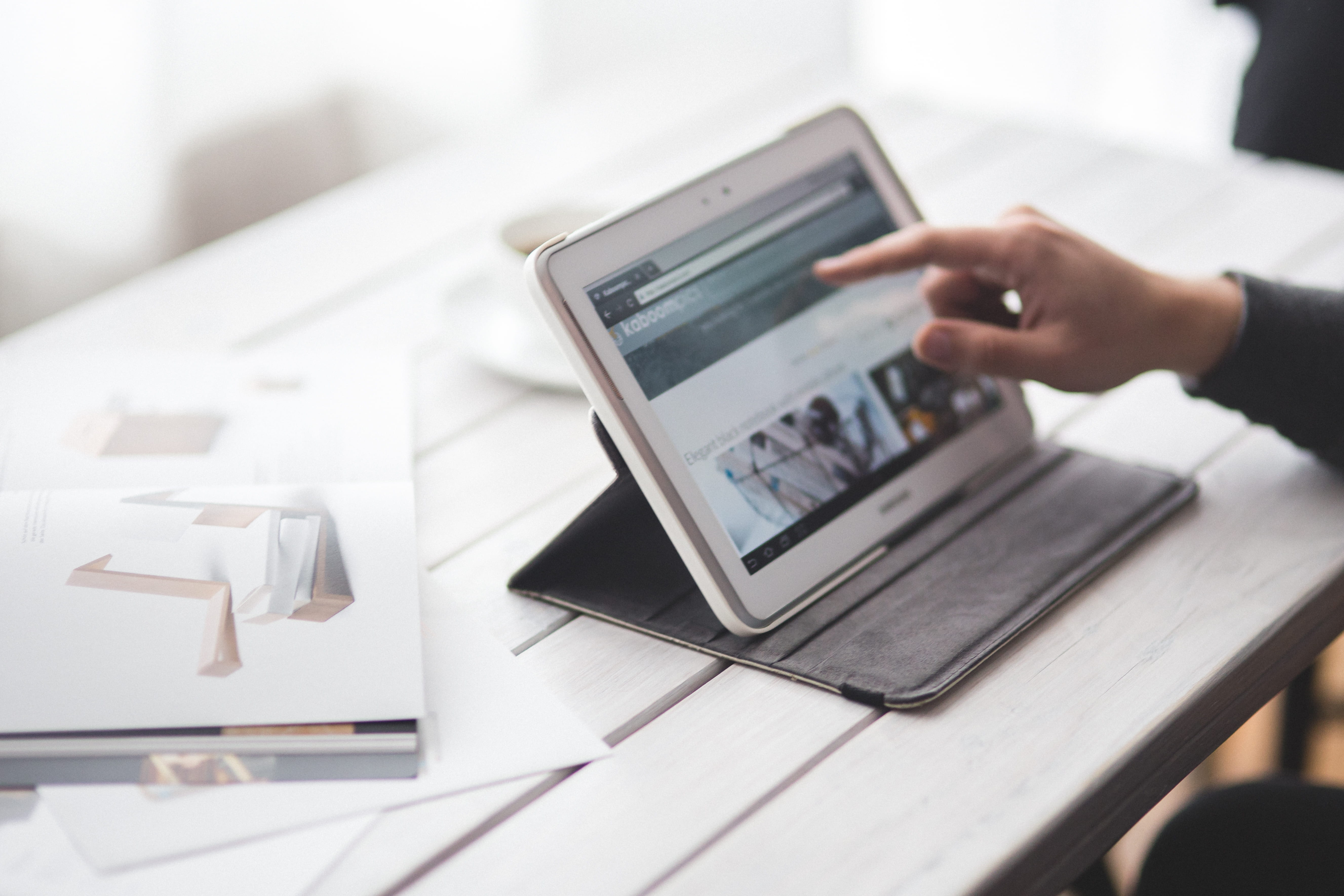Man touching a digital tablet, computer, desk, device, electronics