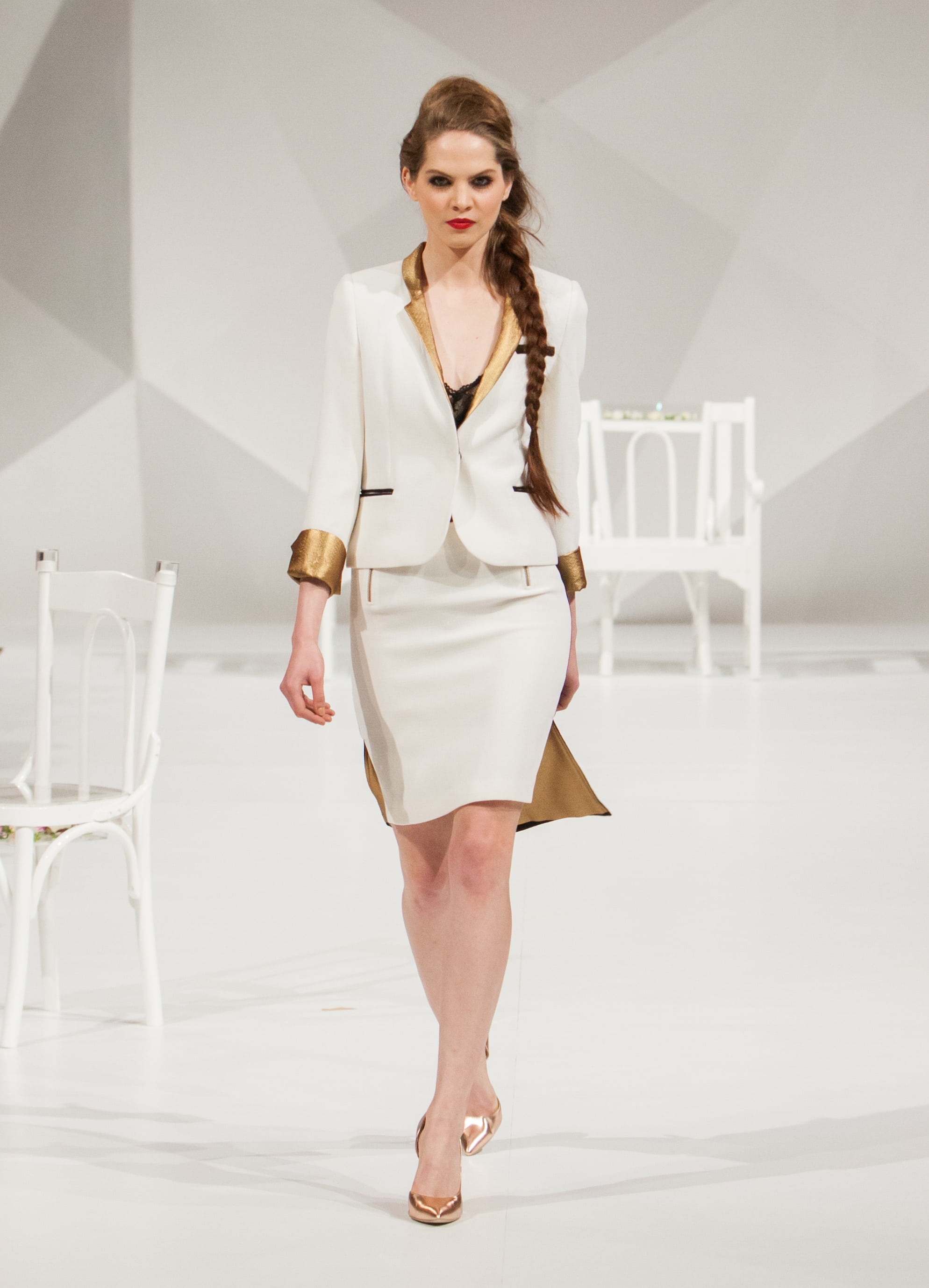 woman wearing white blazer and white skirt, fashion show, catwalk