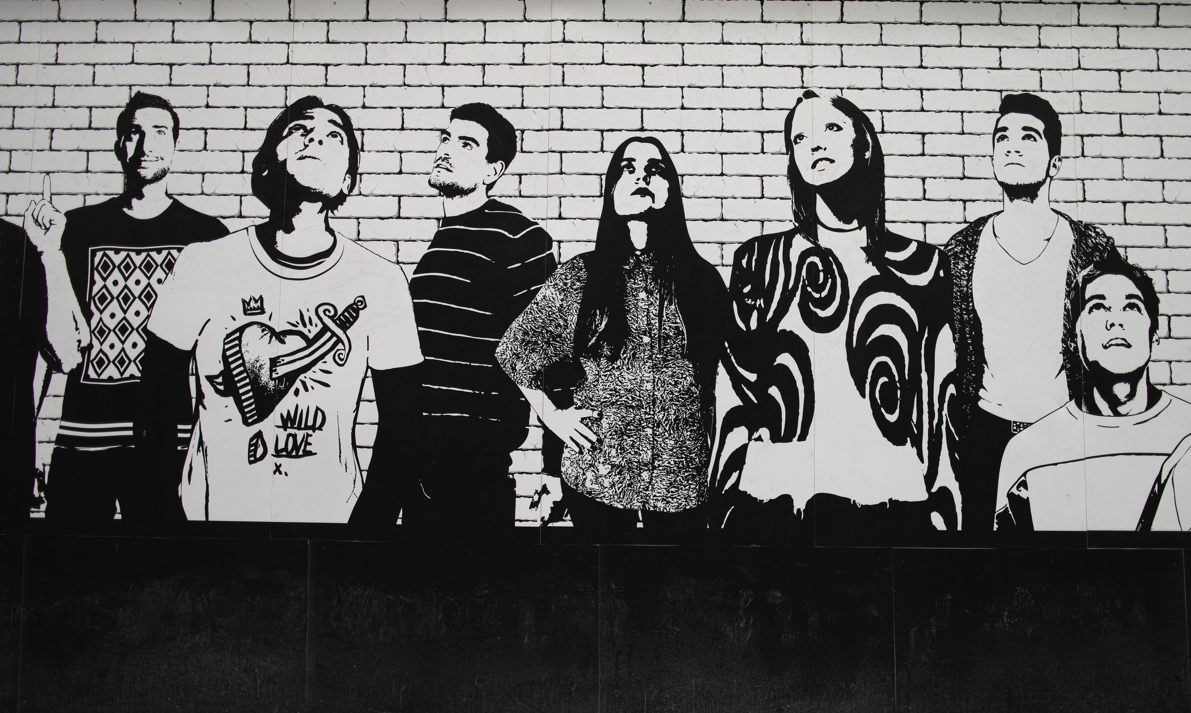 grayscale photo of group of people photo, graffiti, wall, art