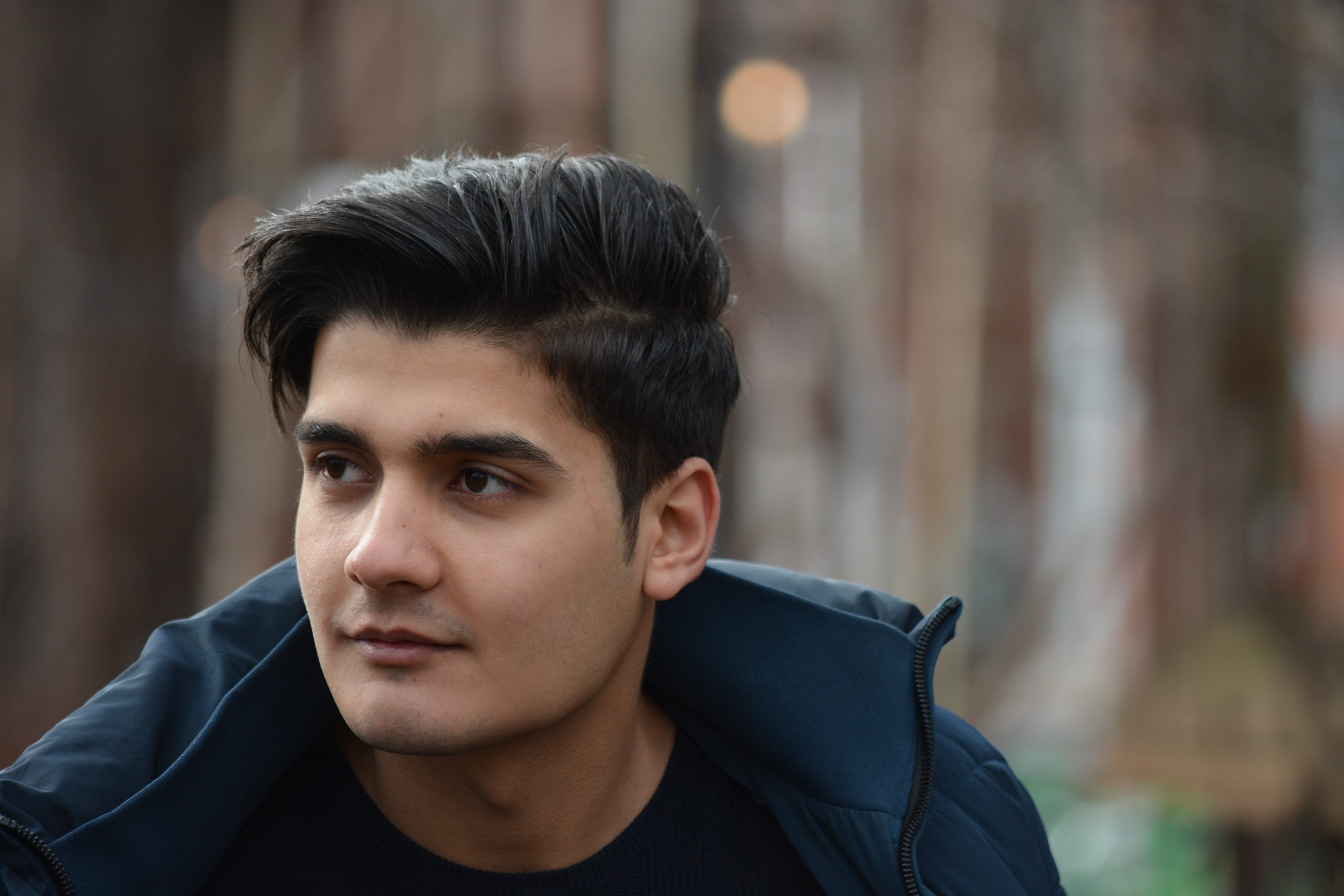 man in blue zip jacket, refugee, young man, portrait, male, person