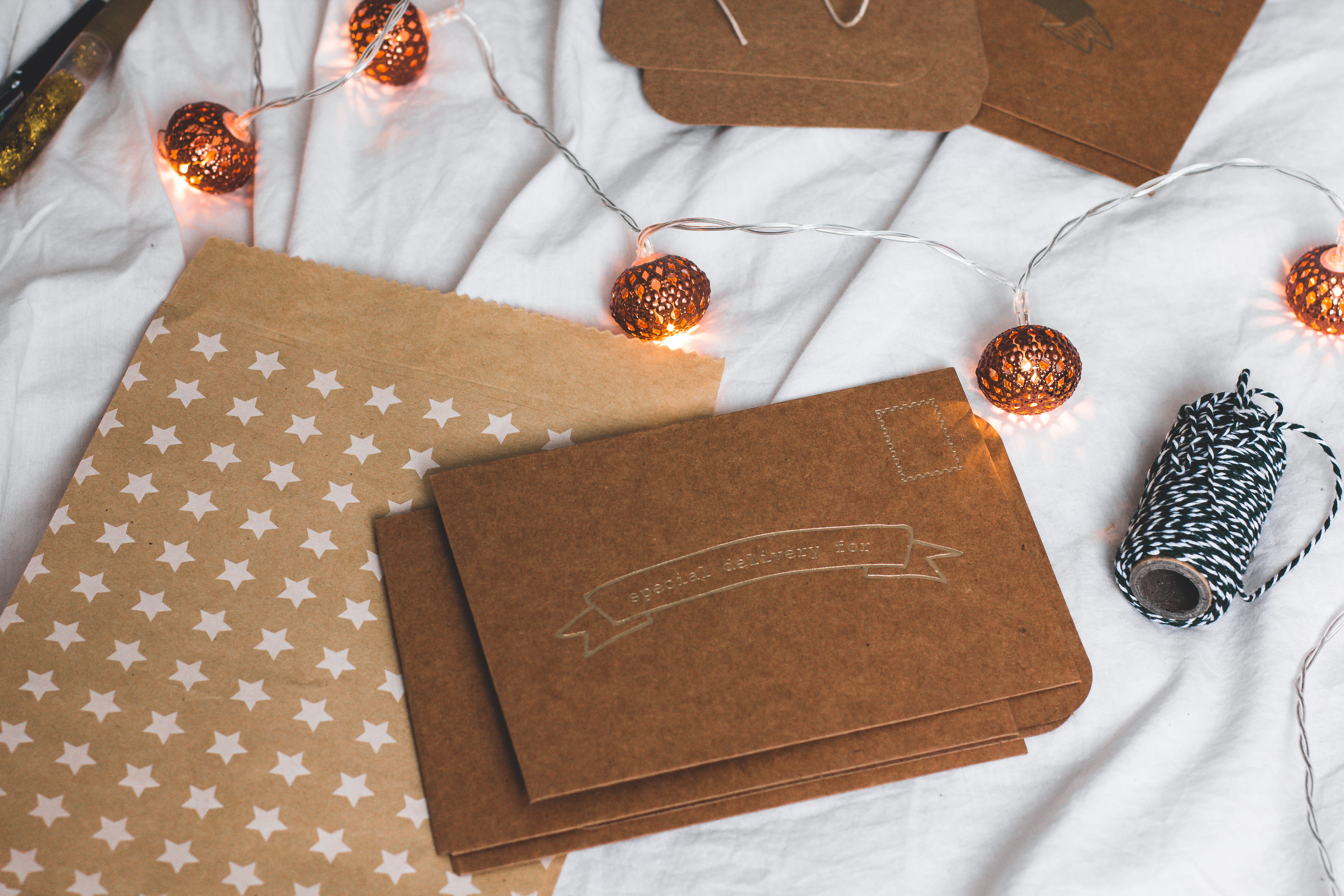 brown box and string lights, rectangular brown box beside string lights