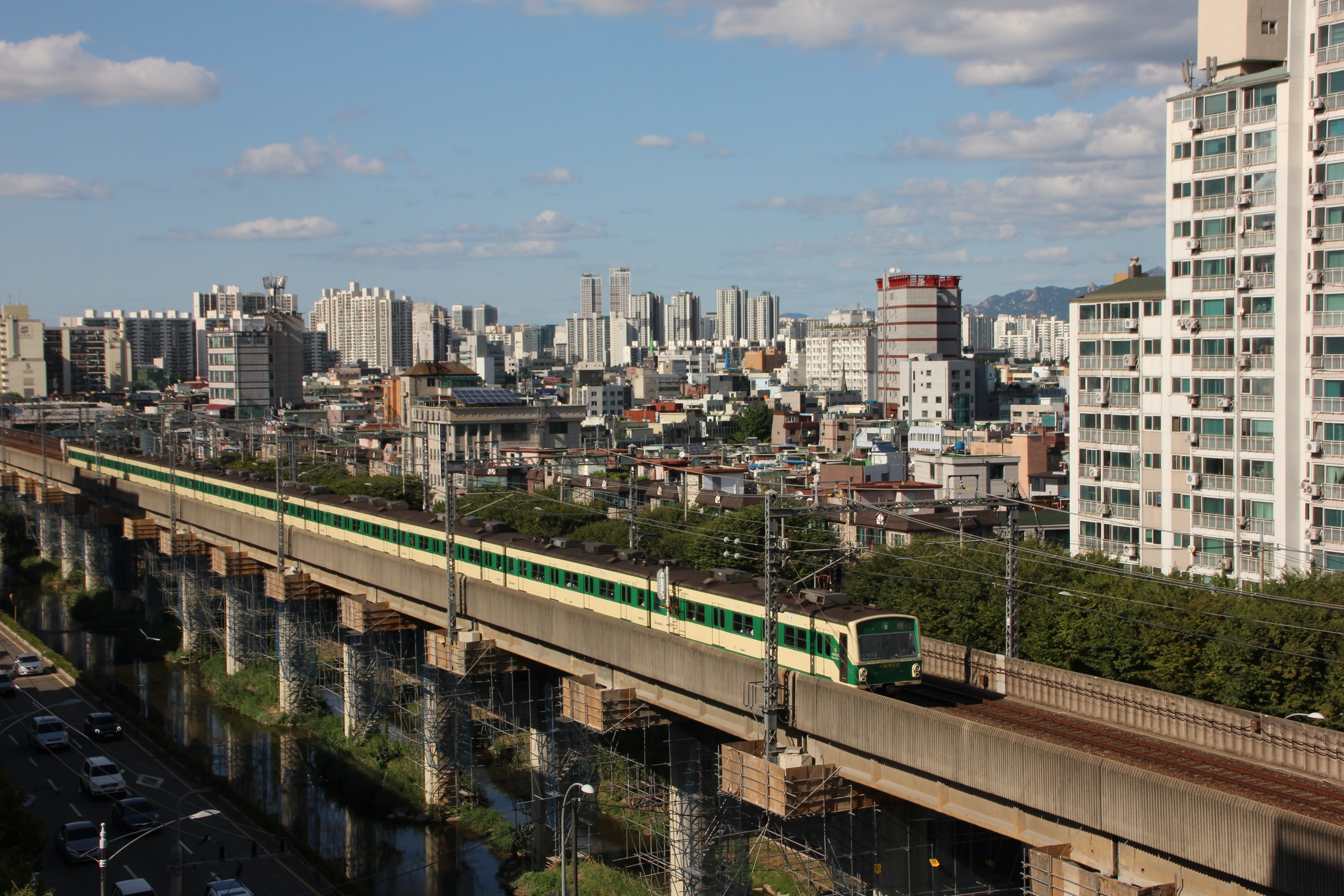 white train on gray concrete rail track, subway, republic of korea