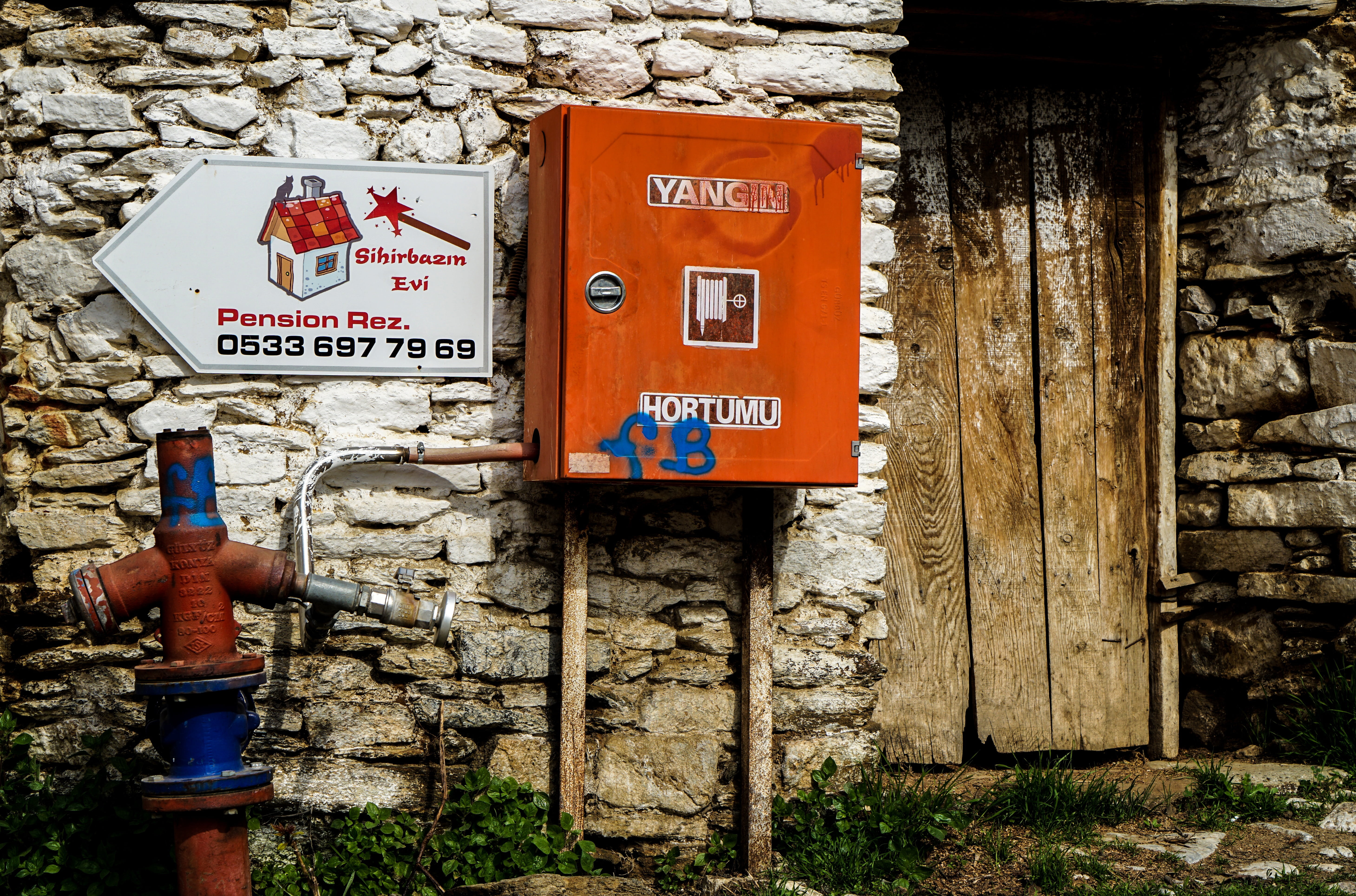waste, wall, building, text, communication, western script