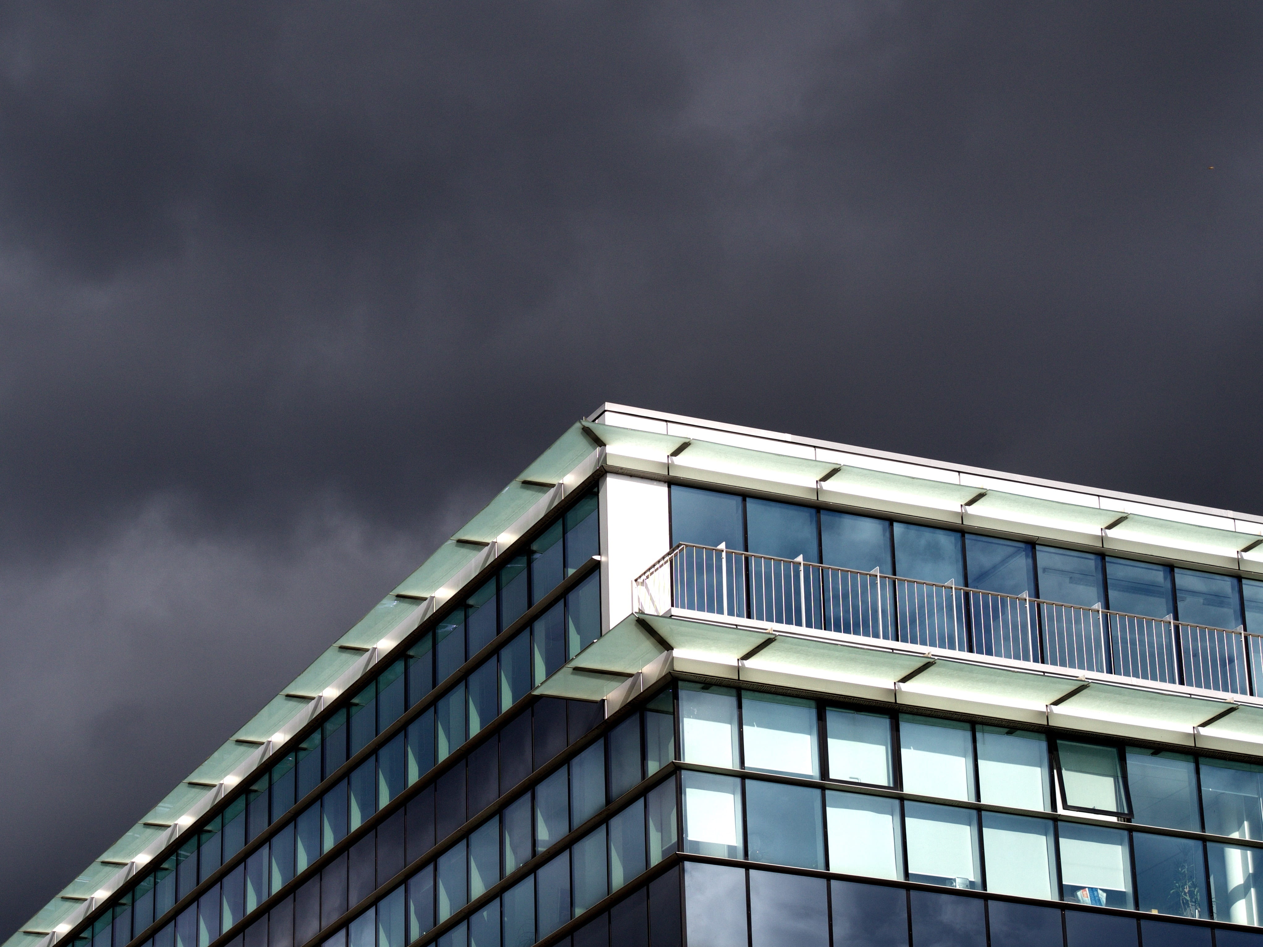 building, windows, architecture, balcony, sky, storm, clouds