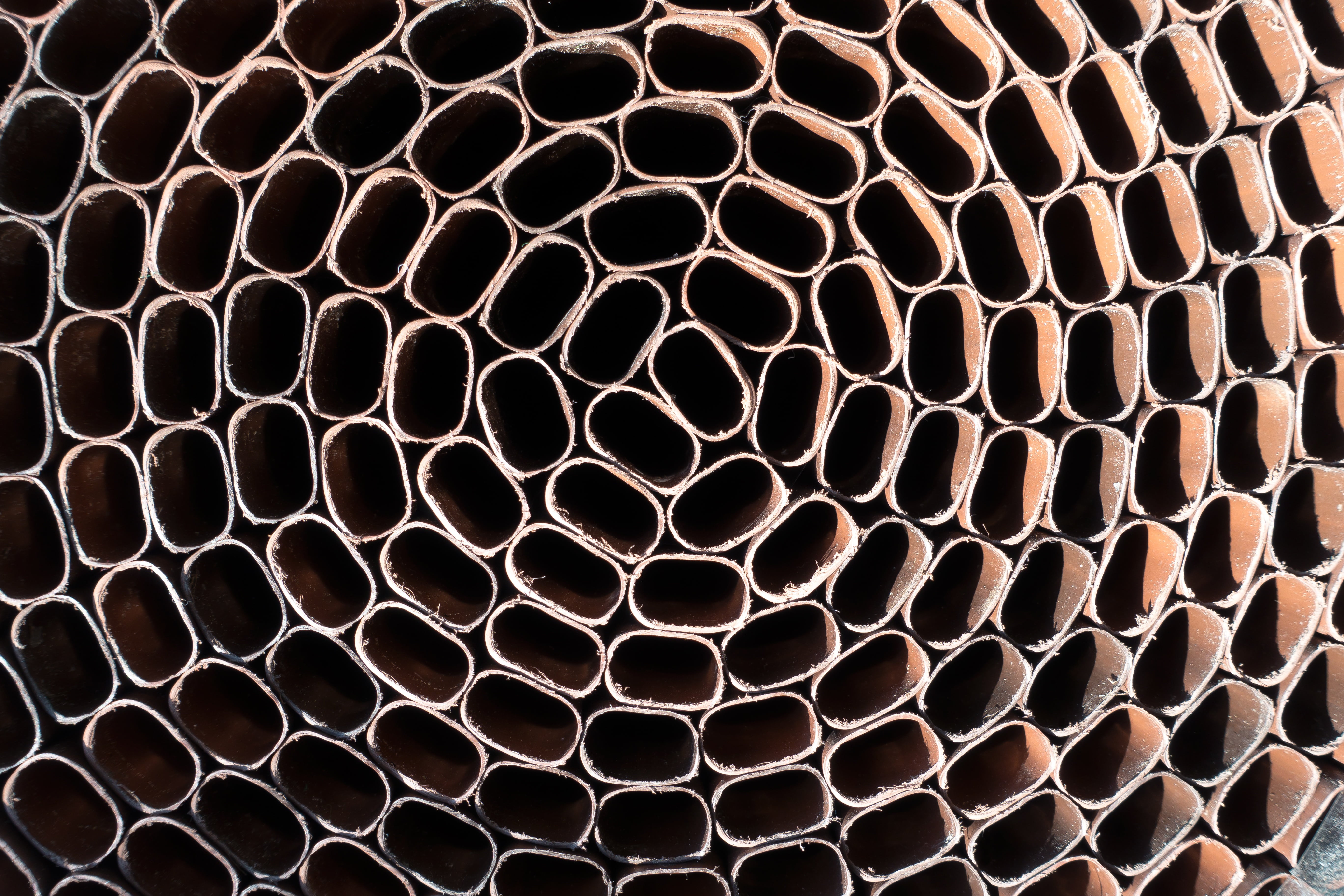 brown container lot, structure, concentric, pattern, oval, about