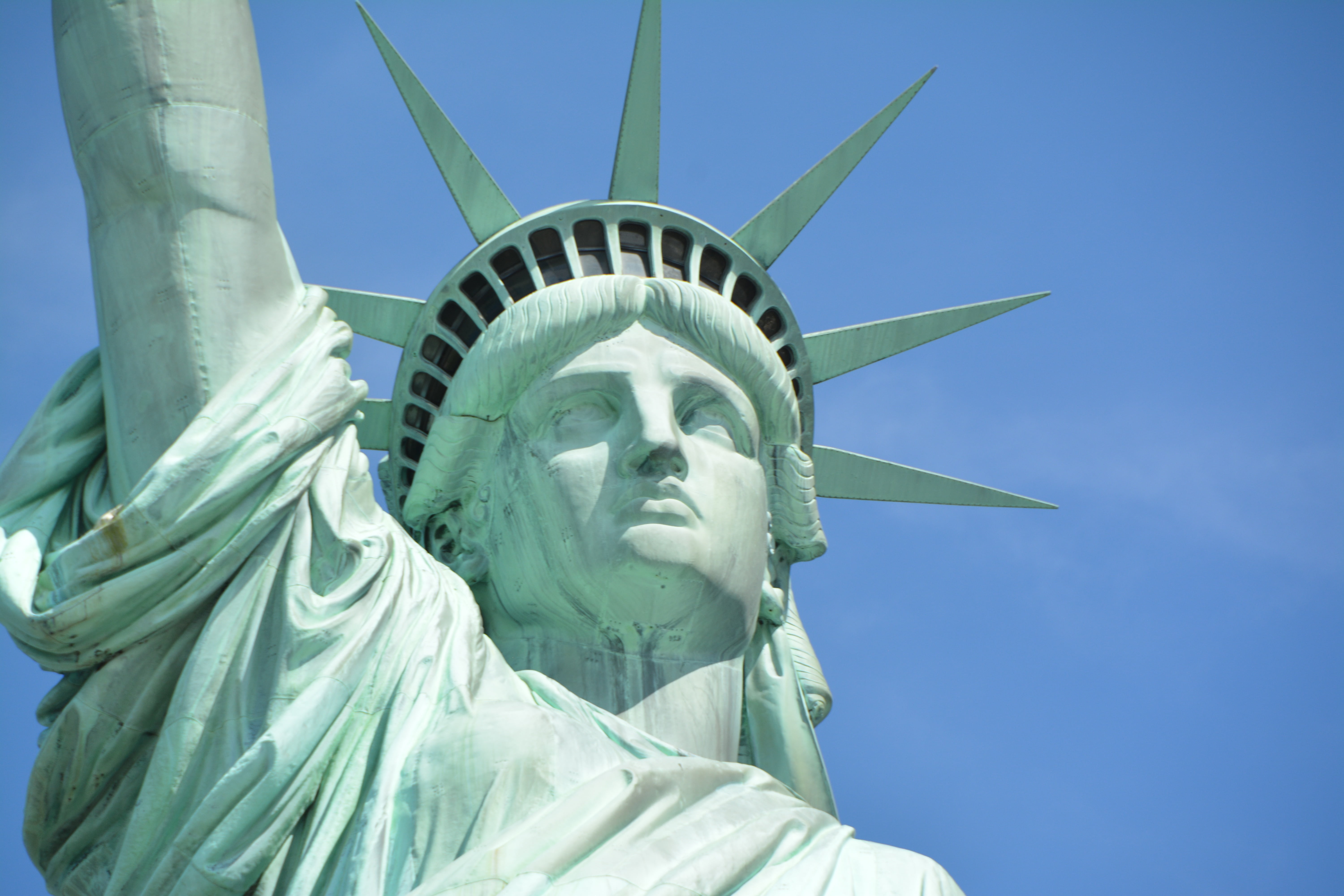 close-up photo of Statue of Liberty, new york, dom, liberty Island